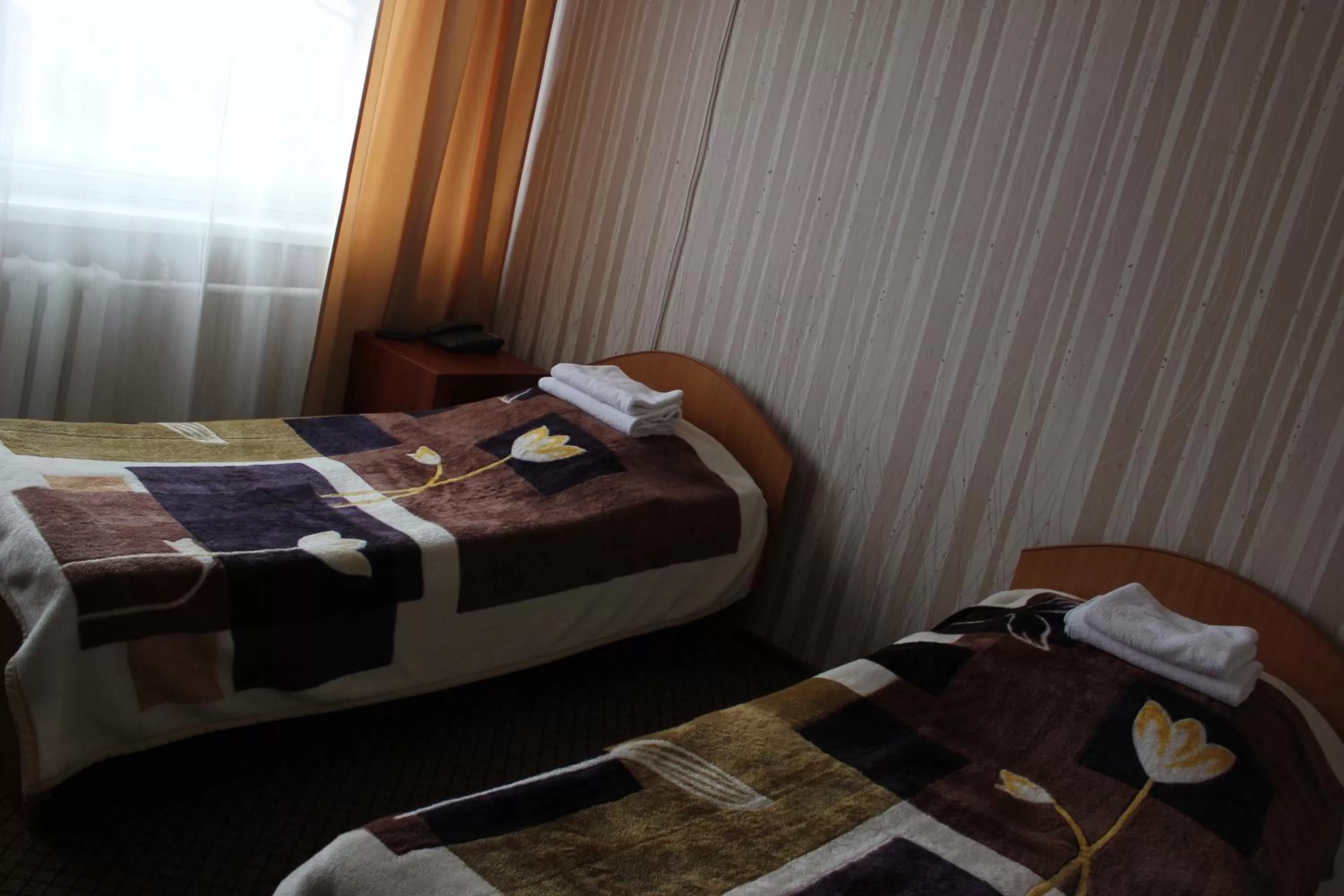 Bed in Ust-Kamenogorsk Hotel