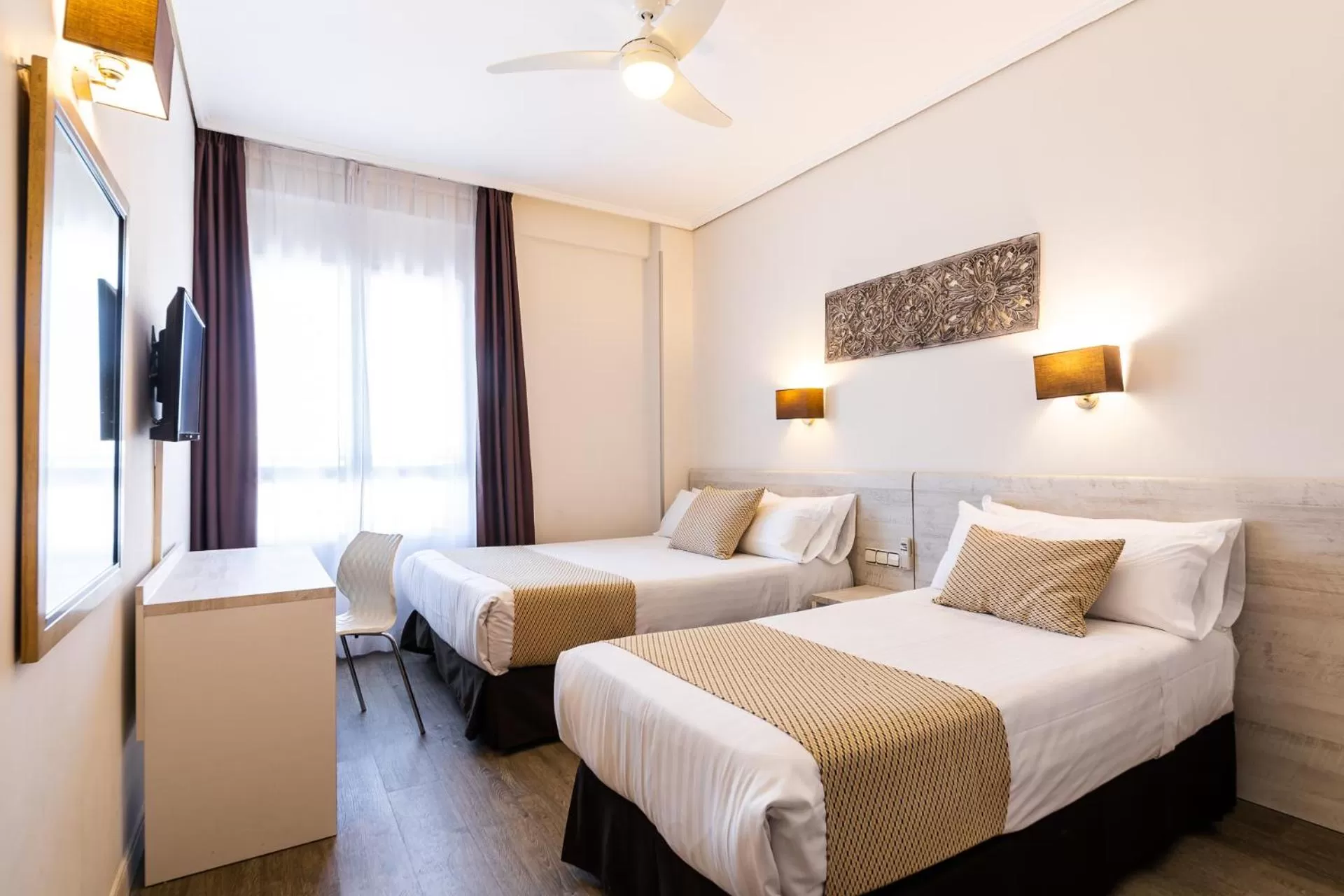 Bed in Sweet Hotel Continental