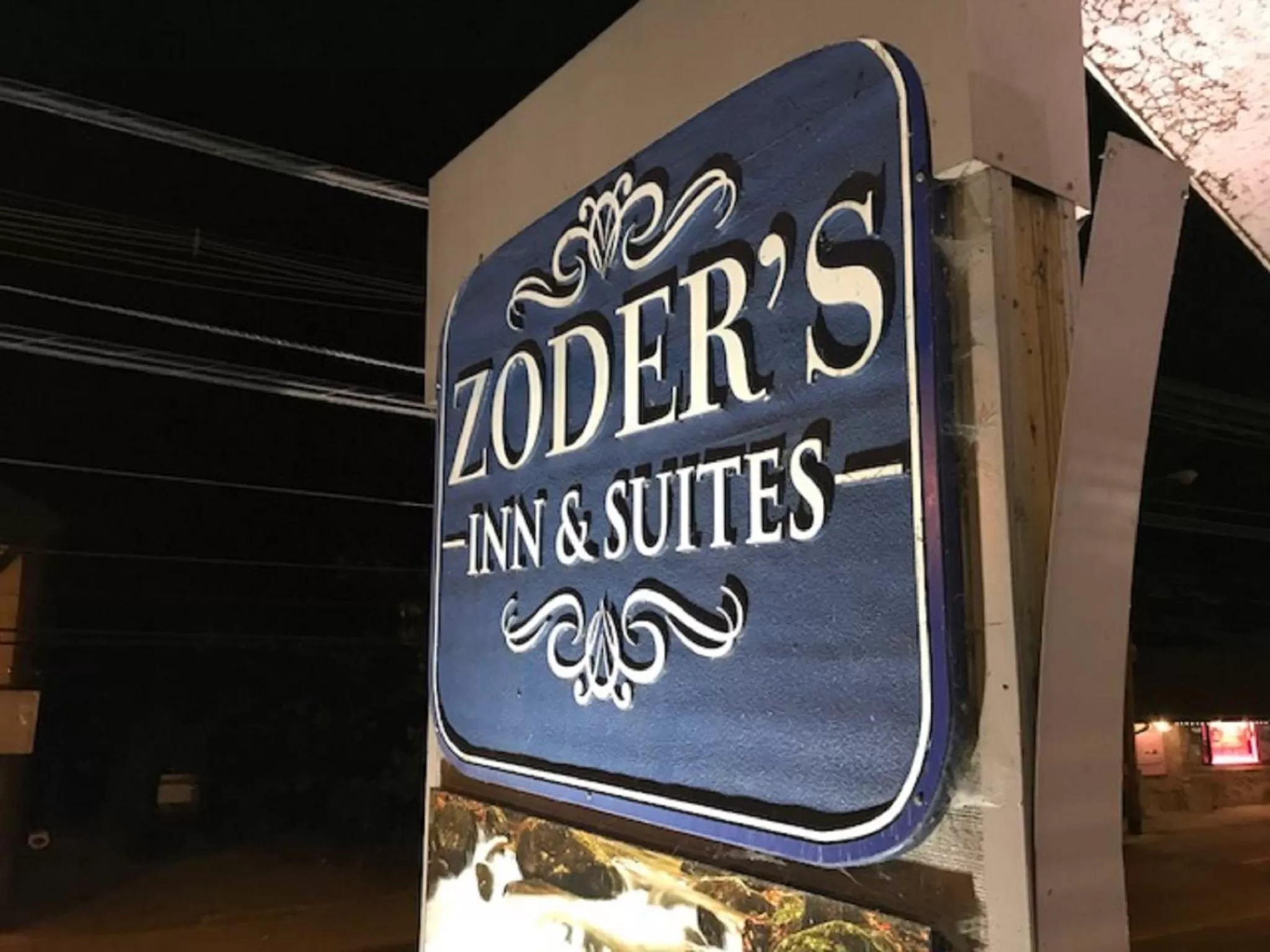 Property logo or sign in Zoders Inn and Suites