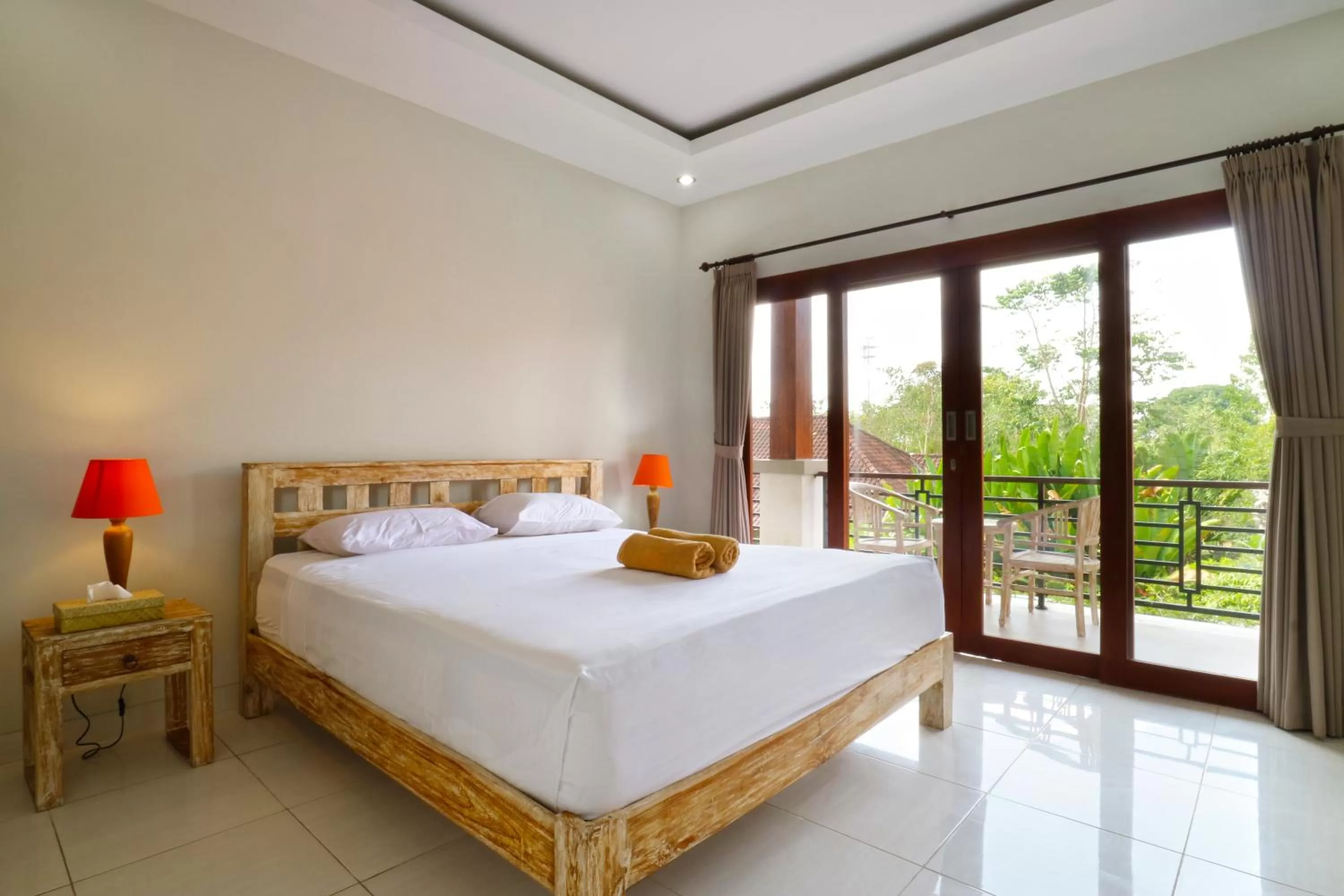 Bed in Avisara Villa & Suite