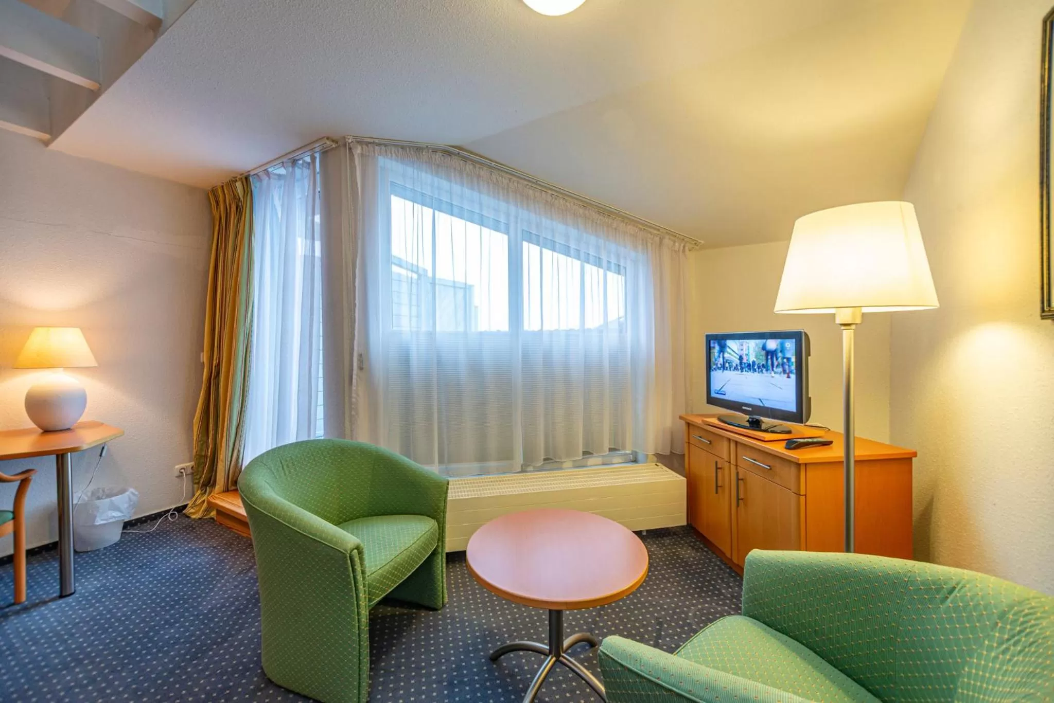 Living room in Hotel Rostock West im "Kritzmow Park"