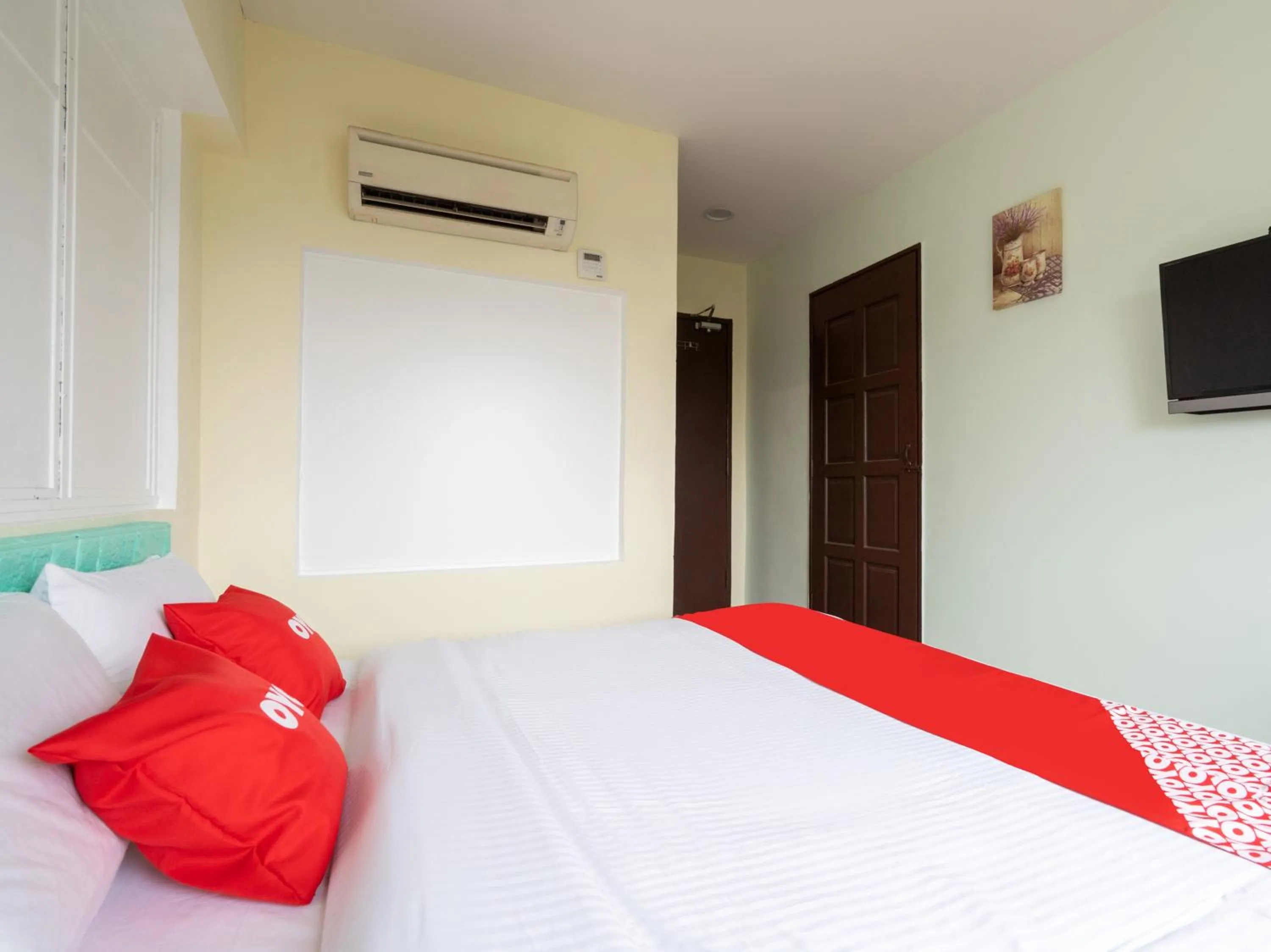 Bedroom in OYO 89717 Budget Star Hotel