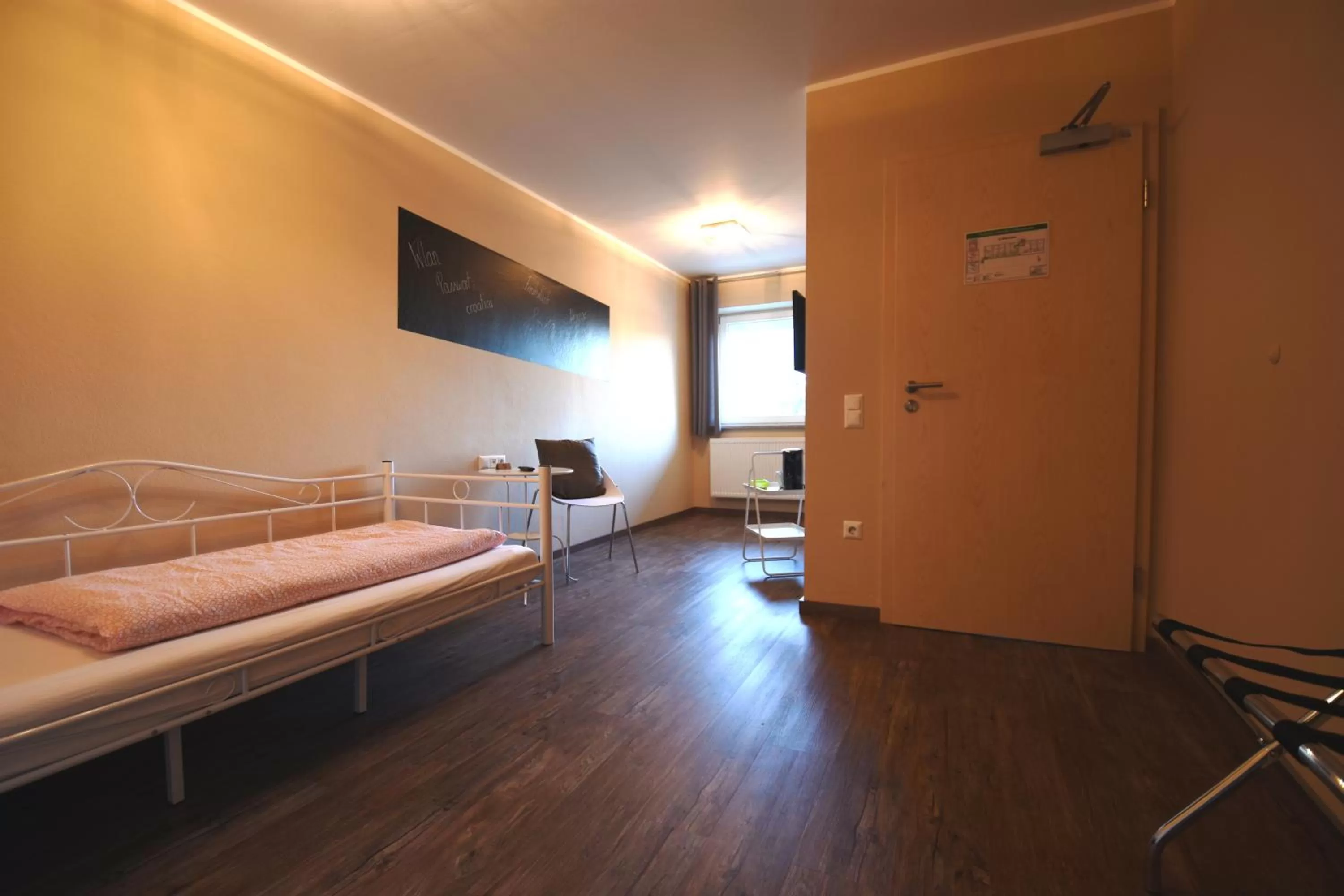 Photo of the whole room, Seating Area in Motel Füssen im Allgäu