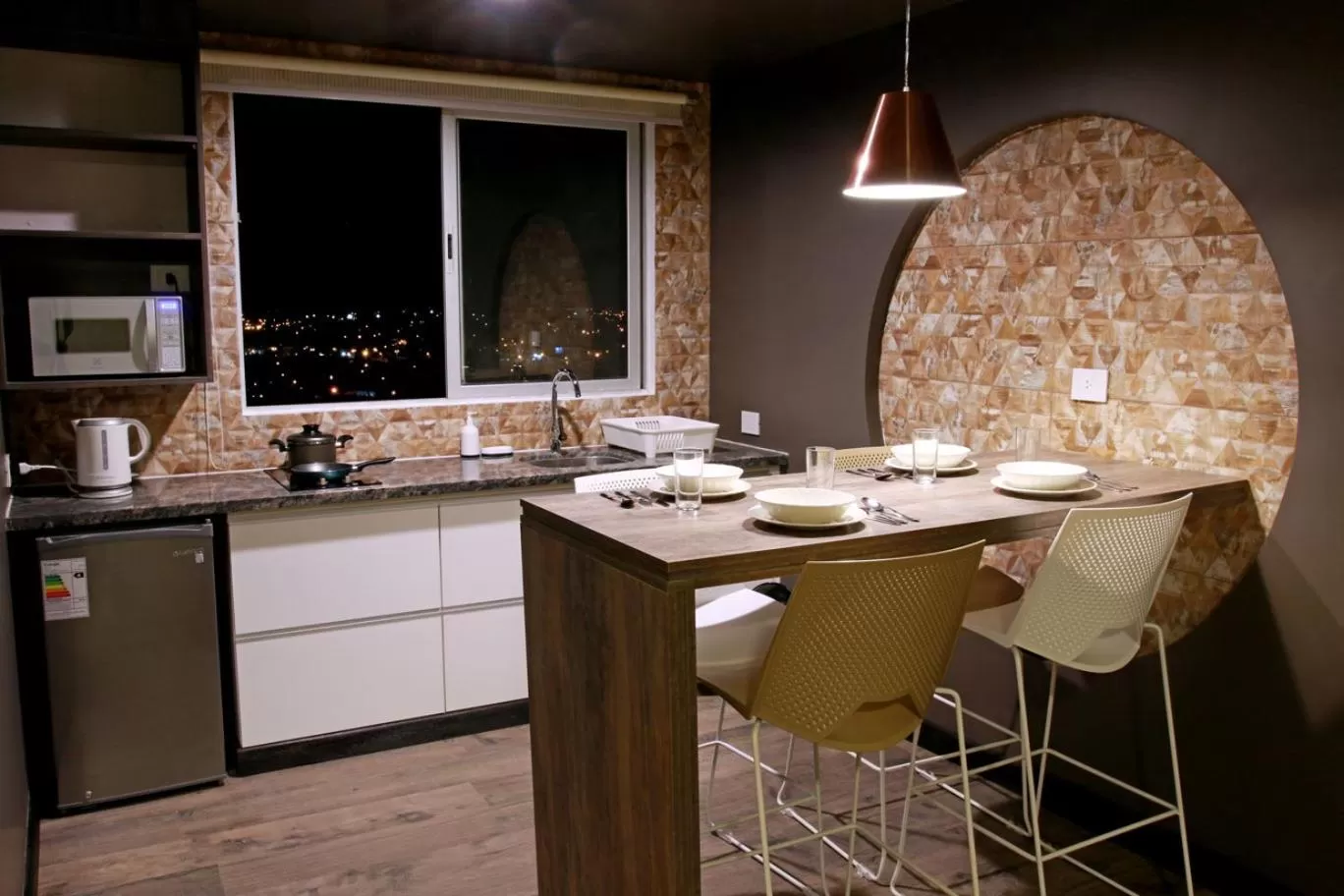 Kitchen or kitchenette in Urban Suites Apart Hotel