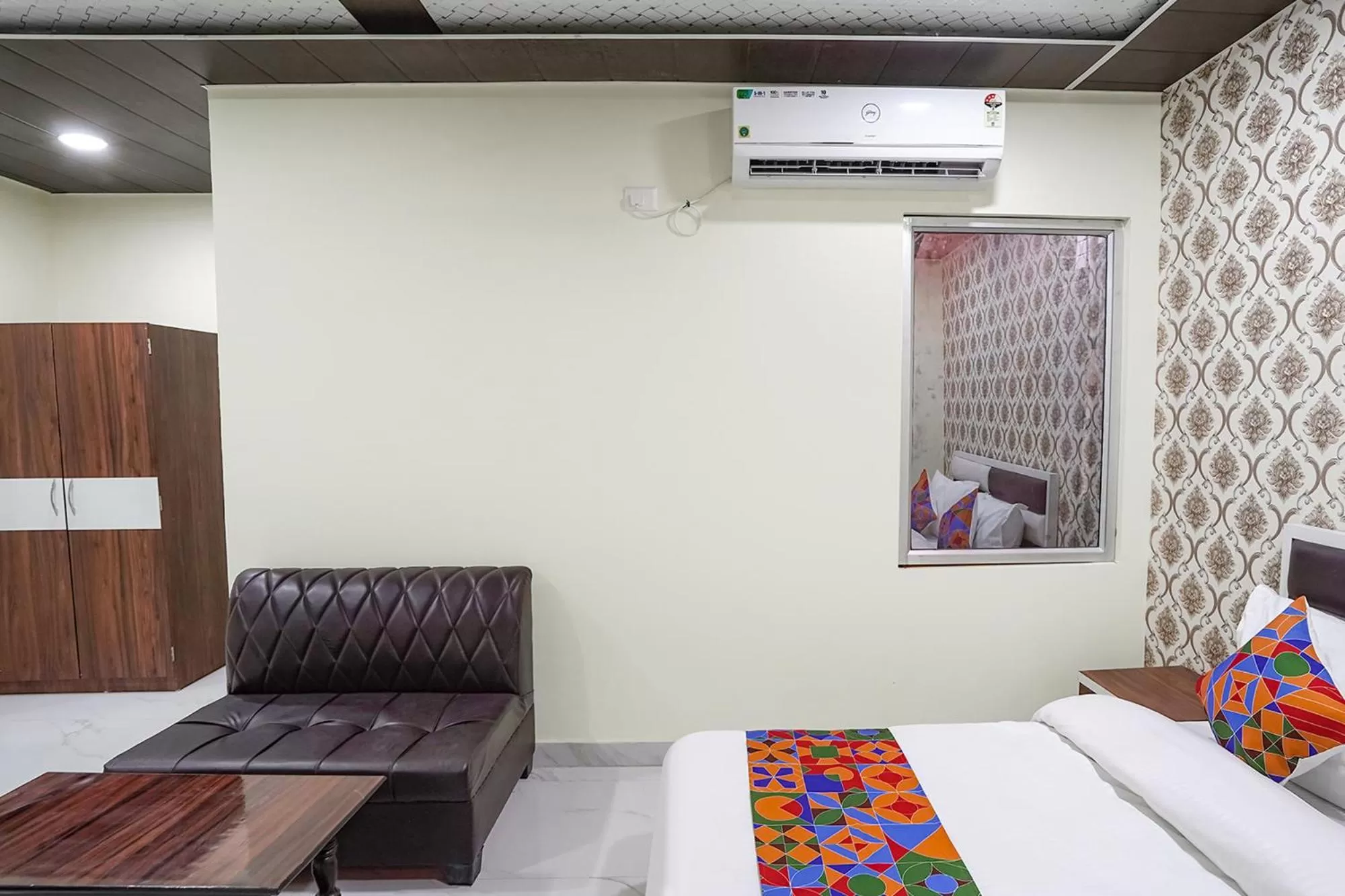 Bed in FabHotel Rajdhani