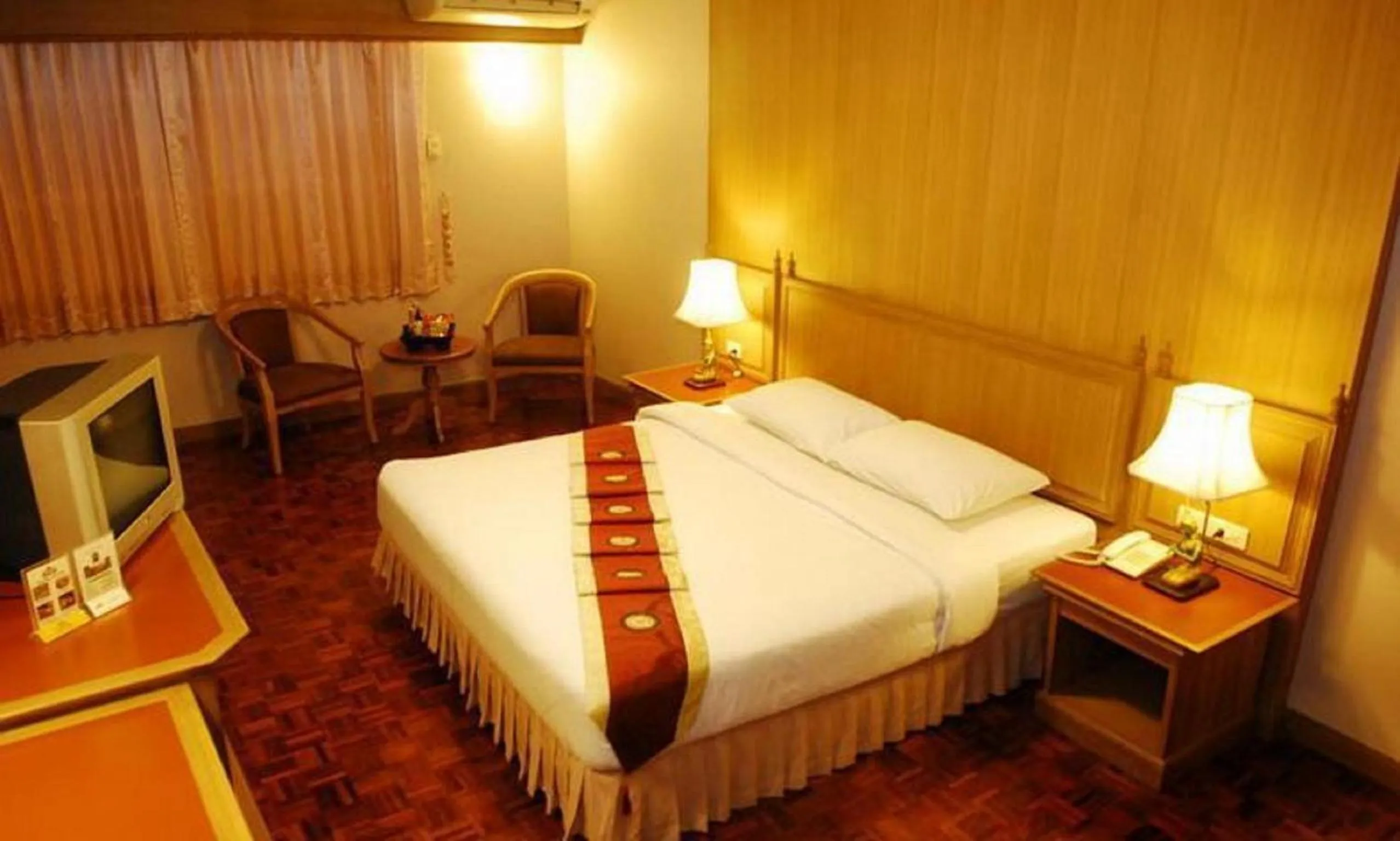 Bed in Silom Village Inn
