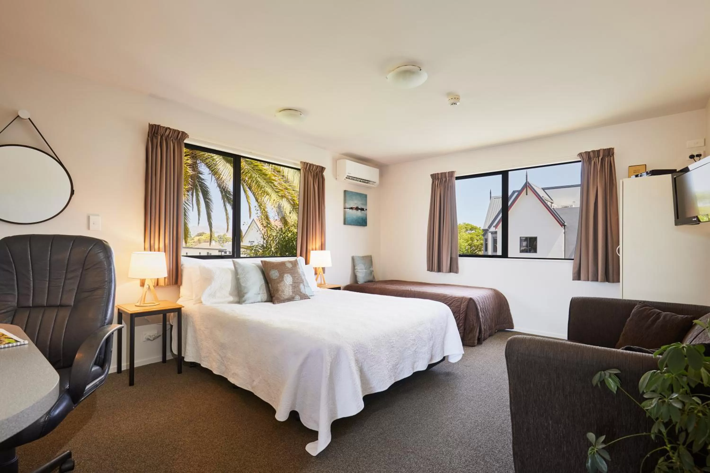 Bed in Blenheim Palms Motel