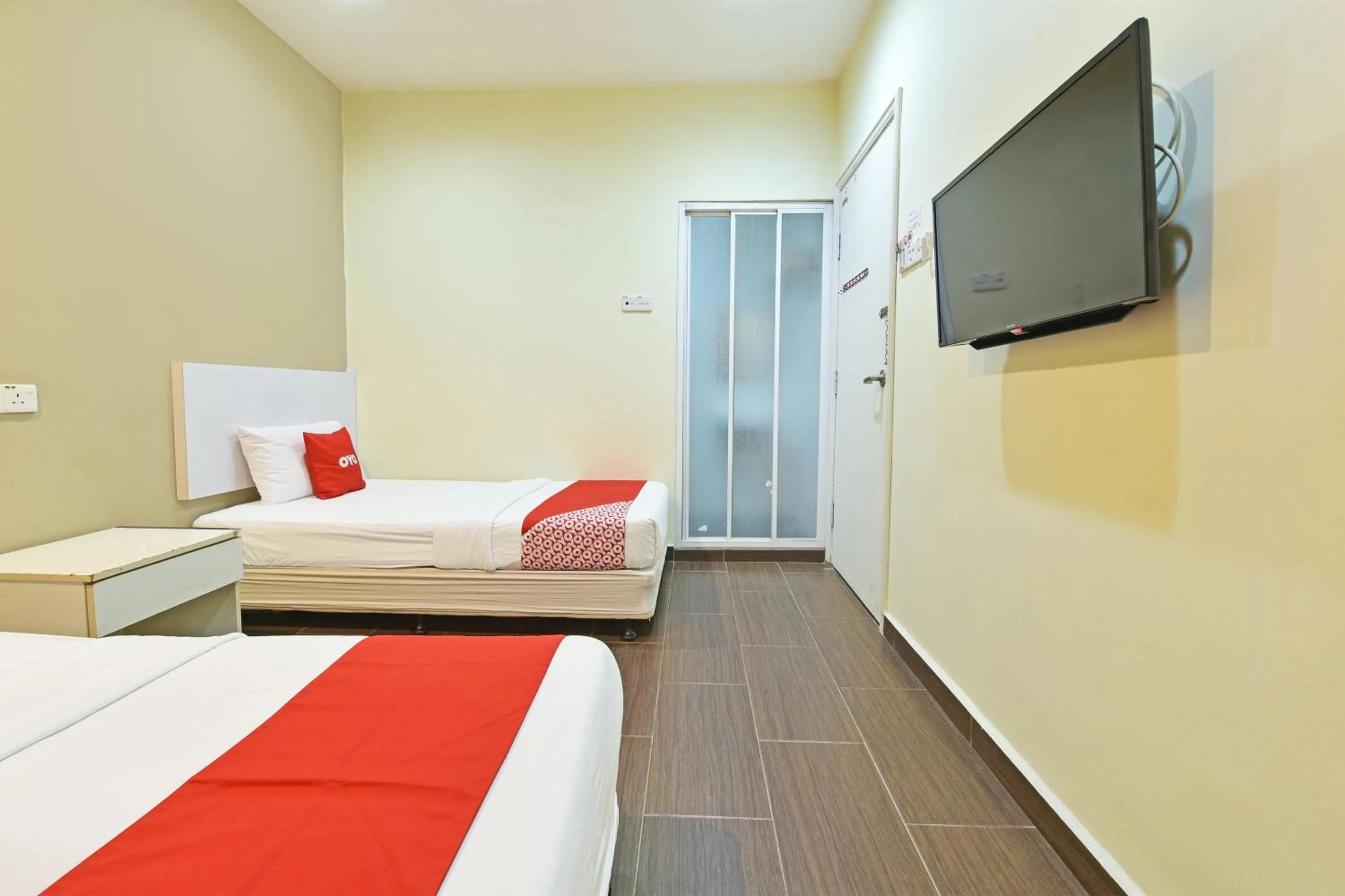 Bedroom, Bed in OYO 90853 New Soho Hotel