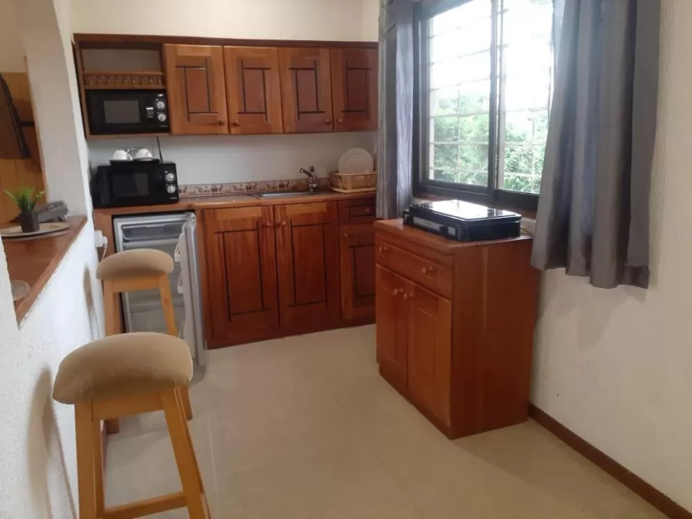Kitchen/Kitchenette in Hans Cottage Botel