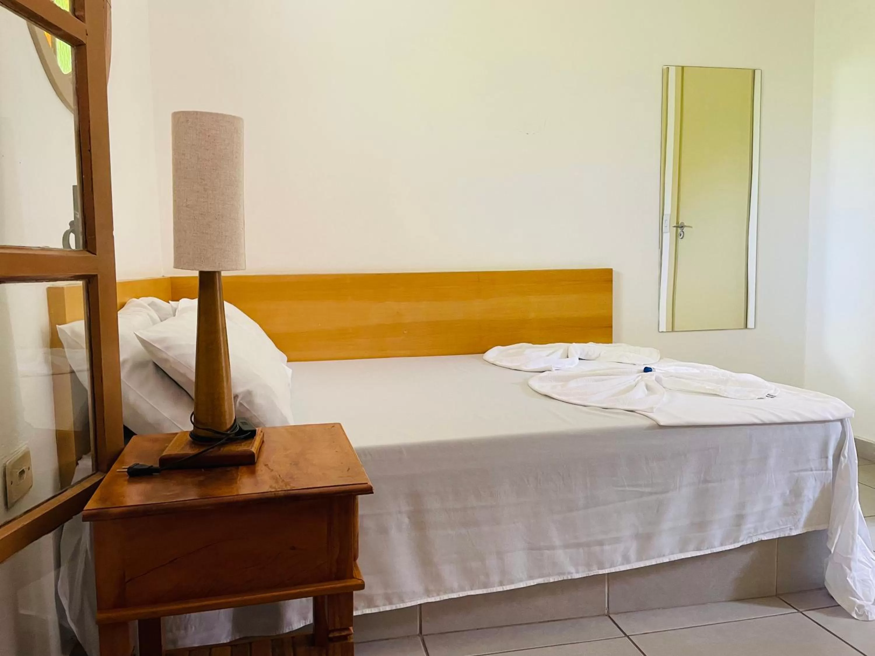 Bed in Pousada Ilha Vitoria