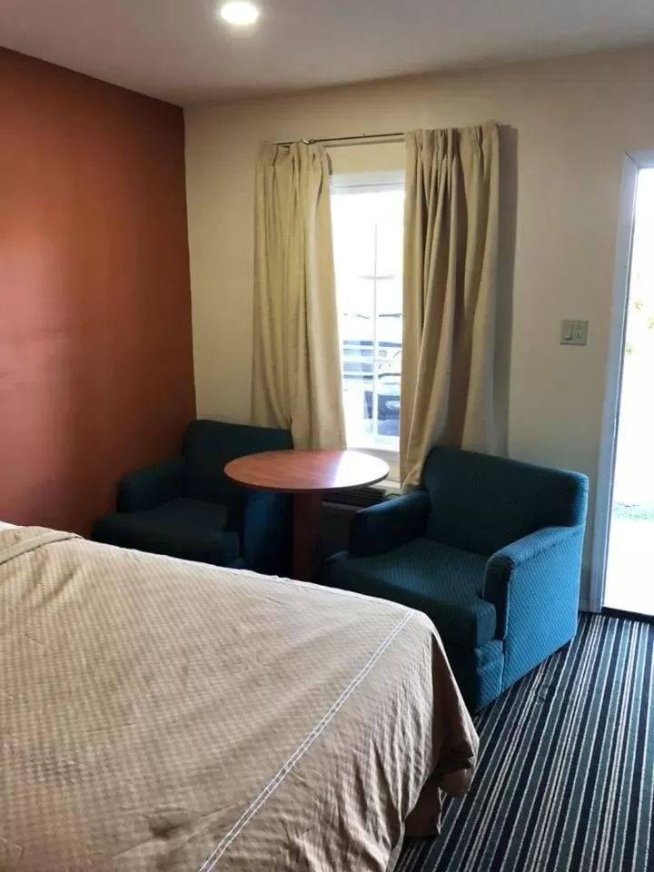 Bed in Scottish Inn and Suites Perry