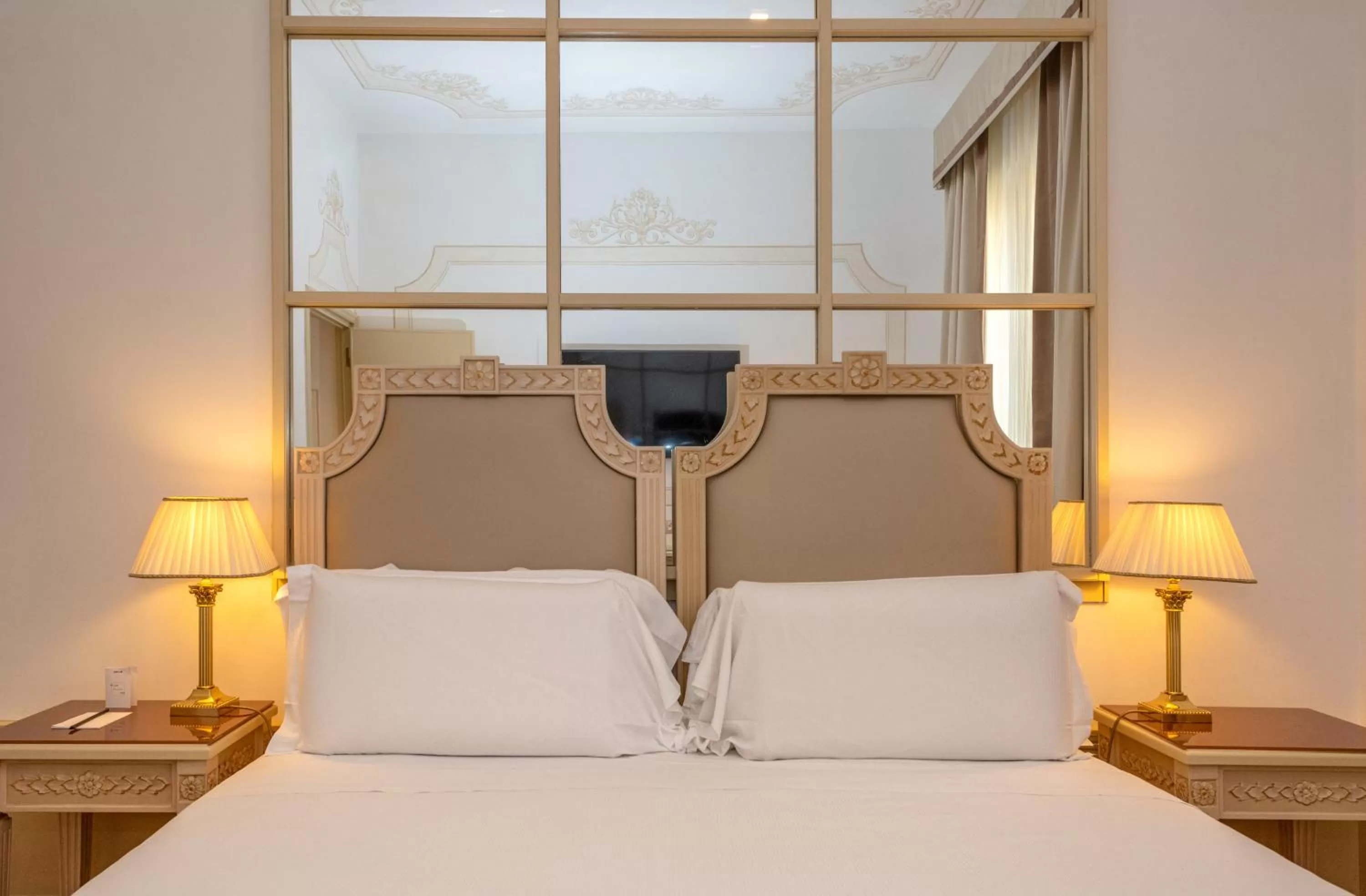 Bed in Radisson Blu GHR Rome