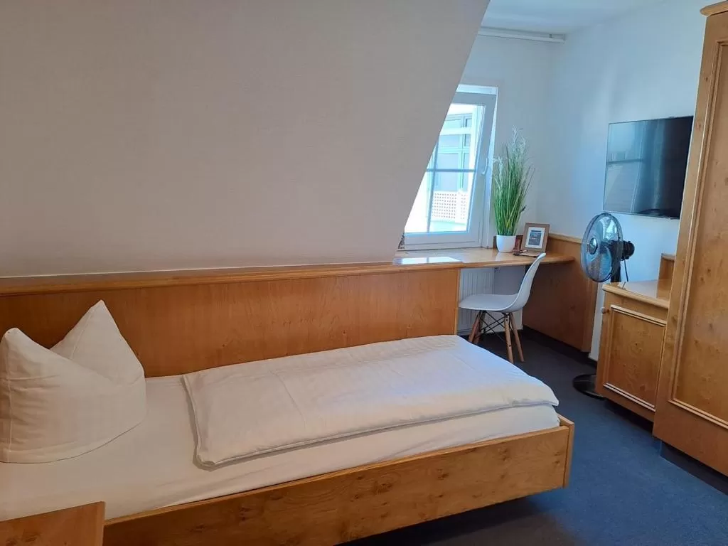 Photo of the whole room, Bed in Stadthotel Waldhorn
