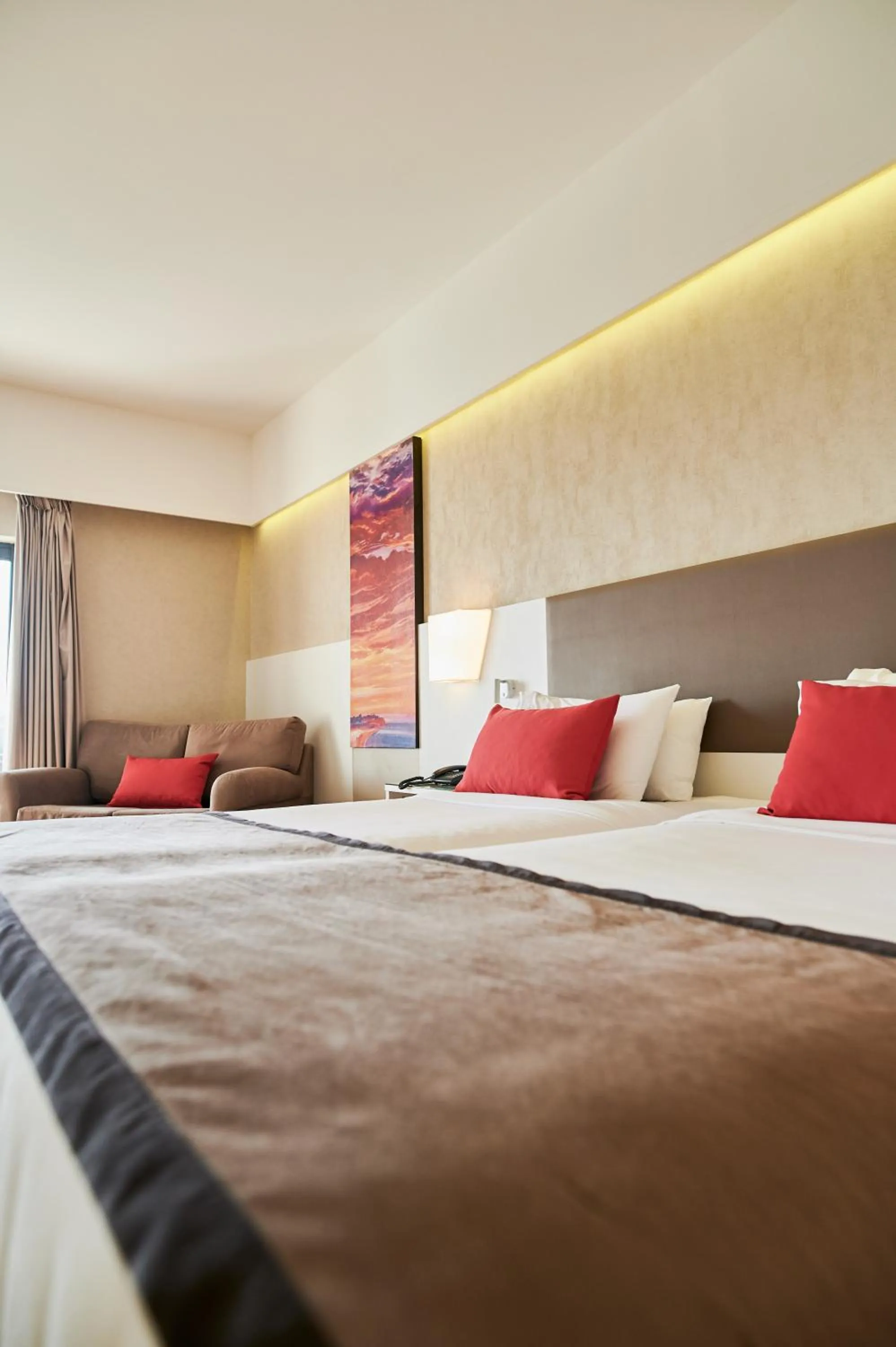 Bed in Ramada Plaza by Wyndham Thraki