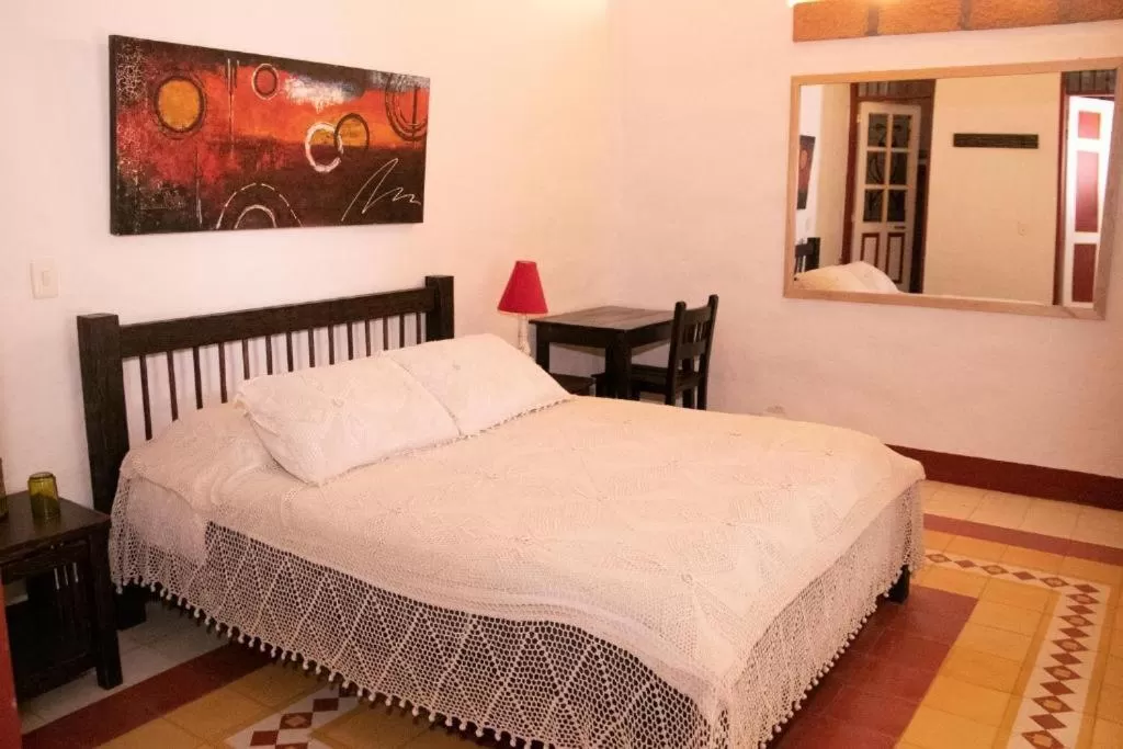 Bed in El Despertar Hotel