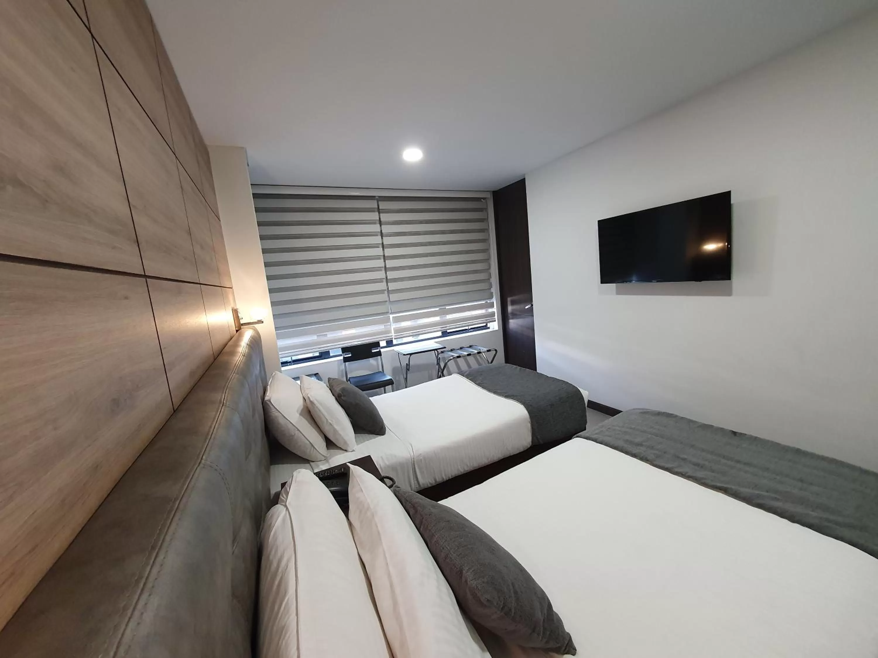 Communal lounge/ TV room, Bed in BOG URBAN HOTEl