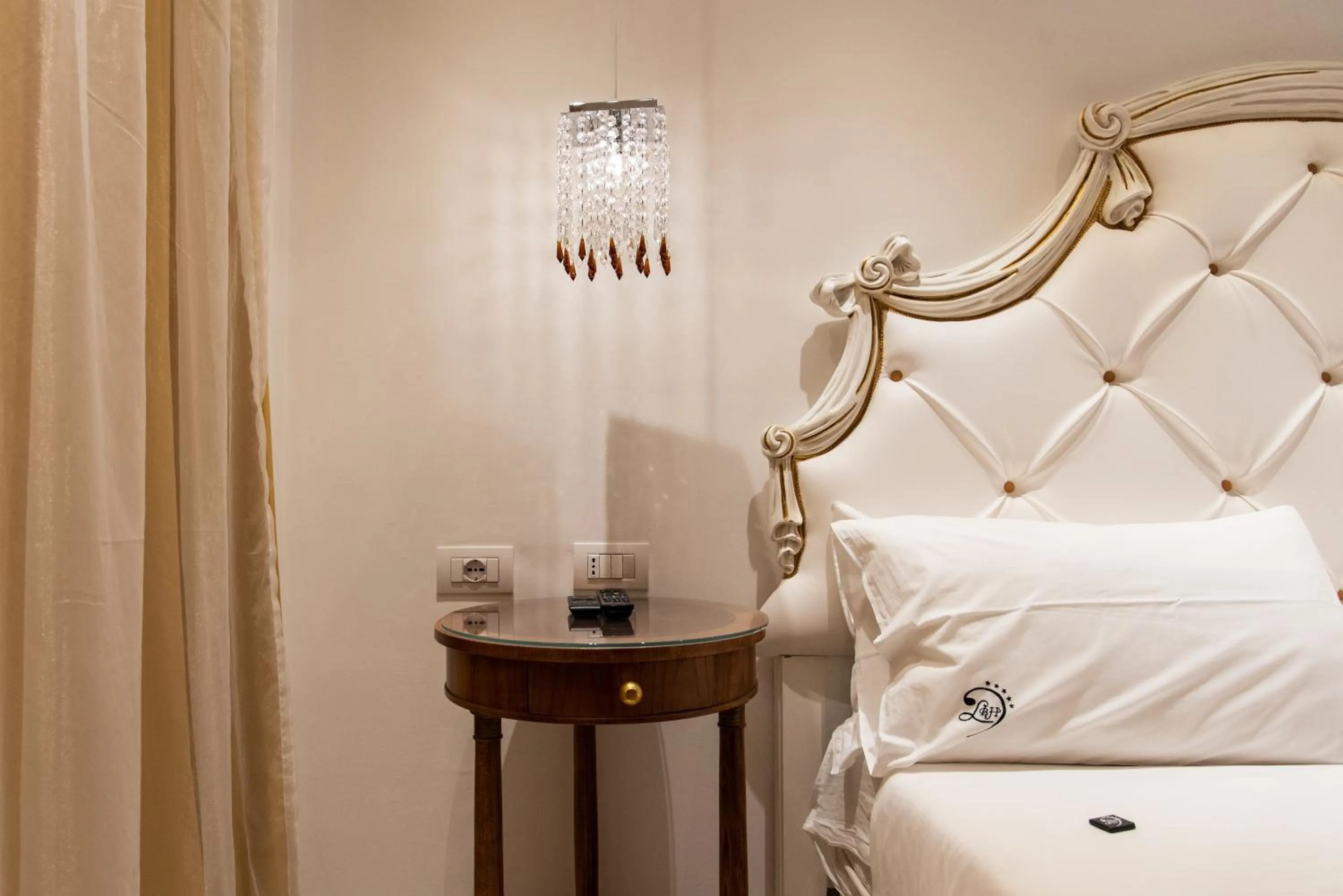 Bed in Ludwig Boutique Hotel & Spa