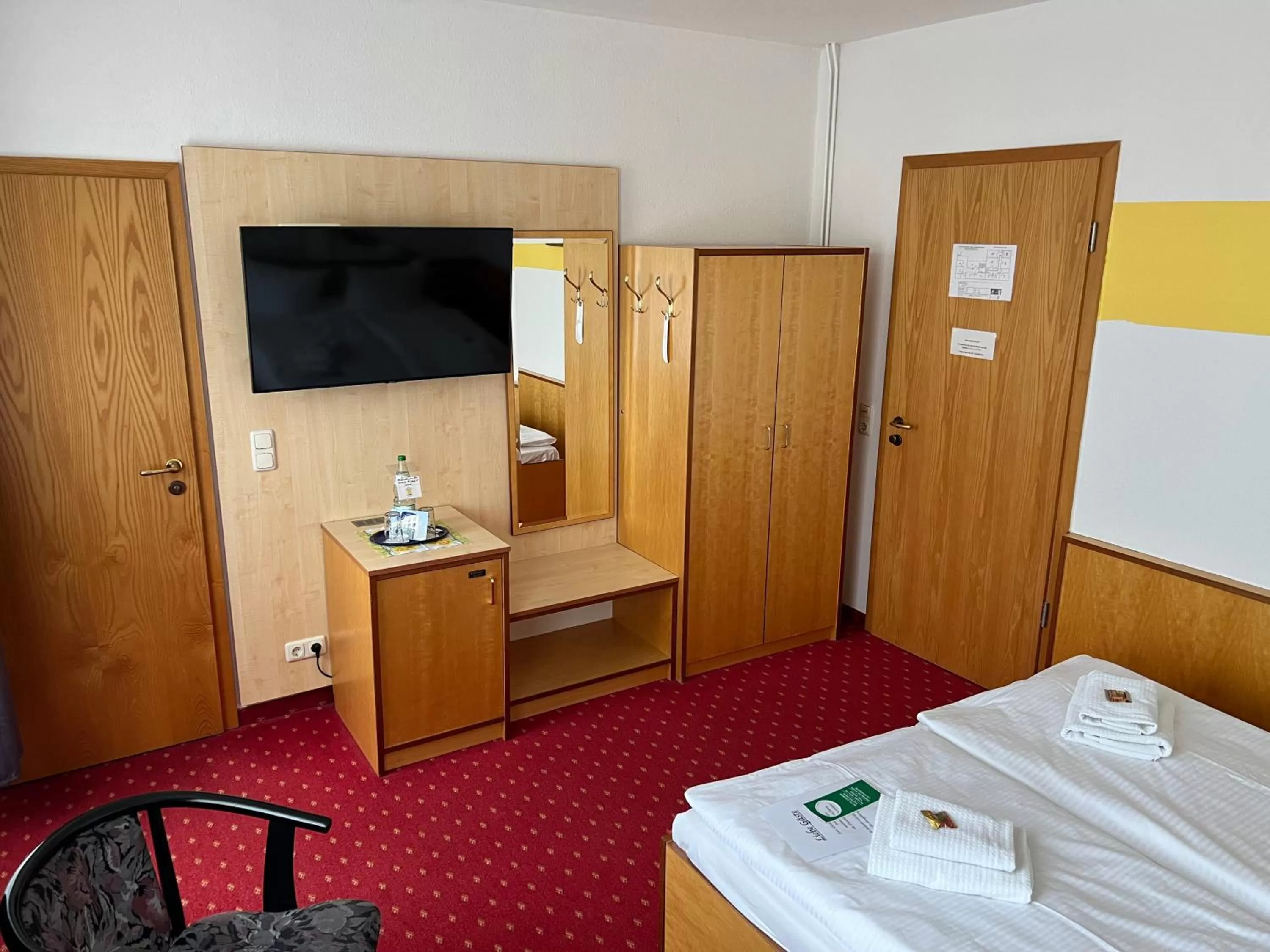 Photo of the whole room, TV/Entertainment Center in Hotel Poseidon