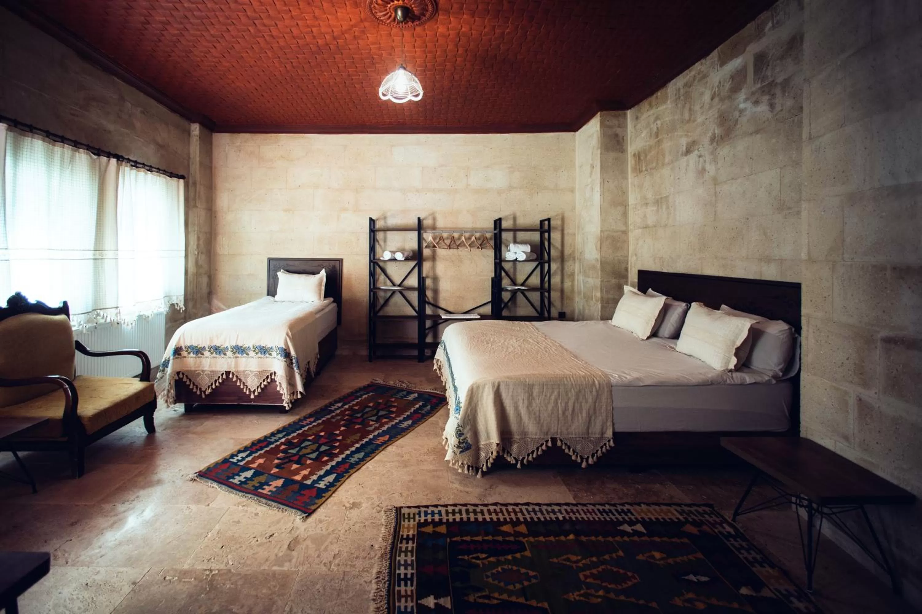 Bed in Azalea Terrace Cave Hotel