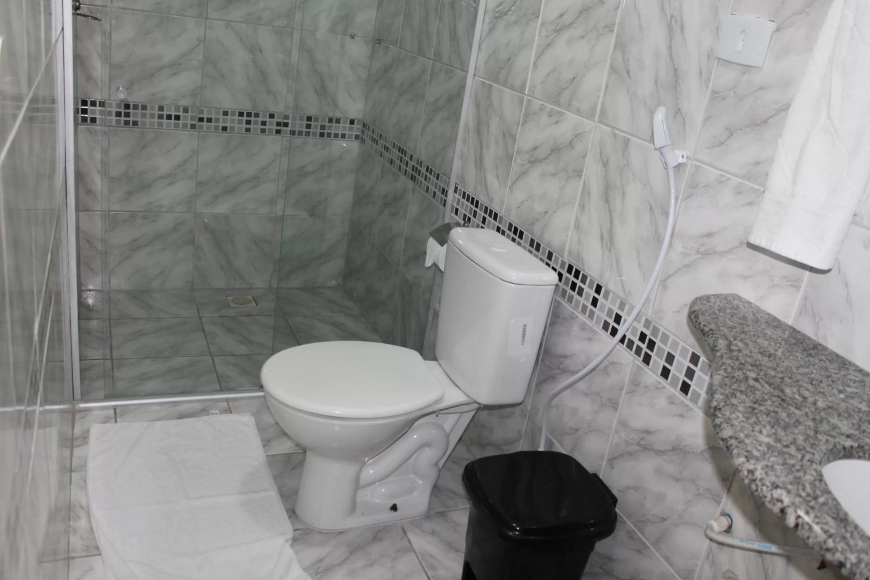 Bathroom in Pousada Das Palmeiras