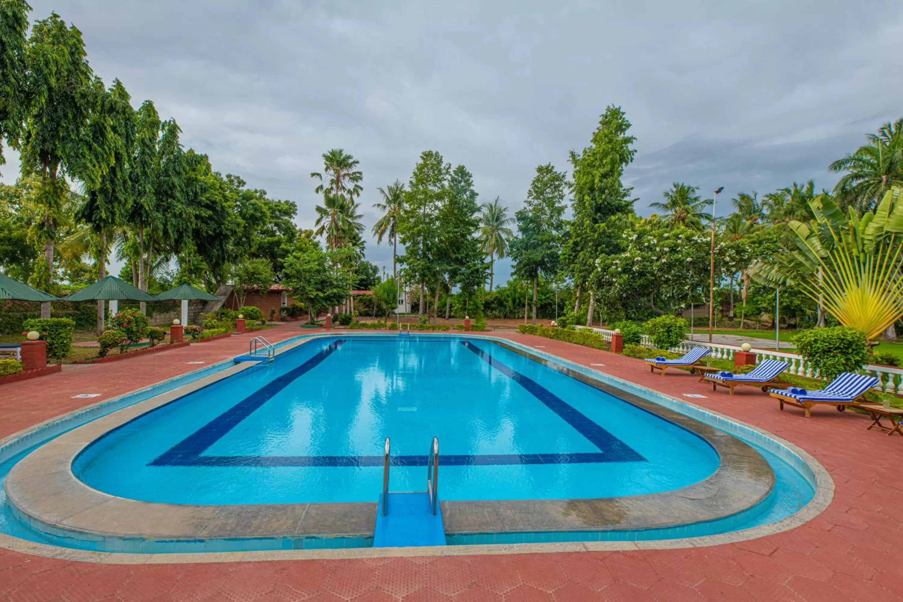 Swimming pool in GReaT Trails Riverview Thanjavur By GRT Hotels