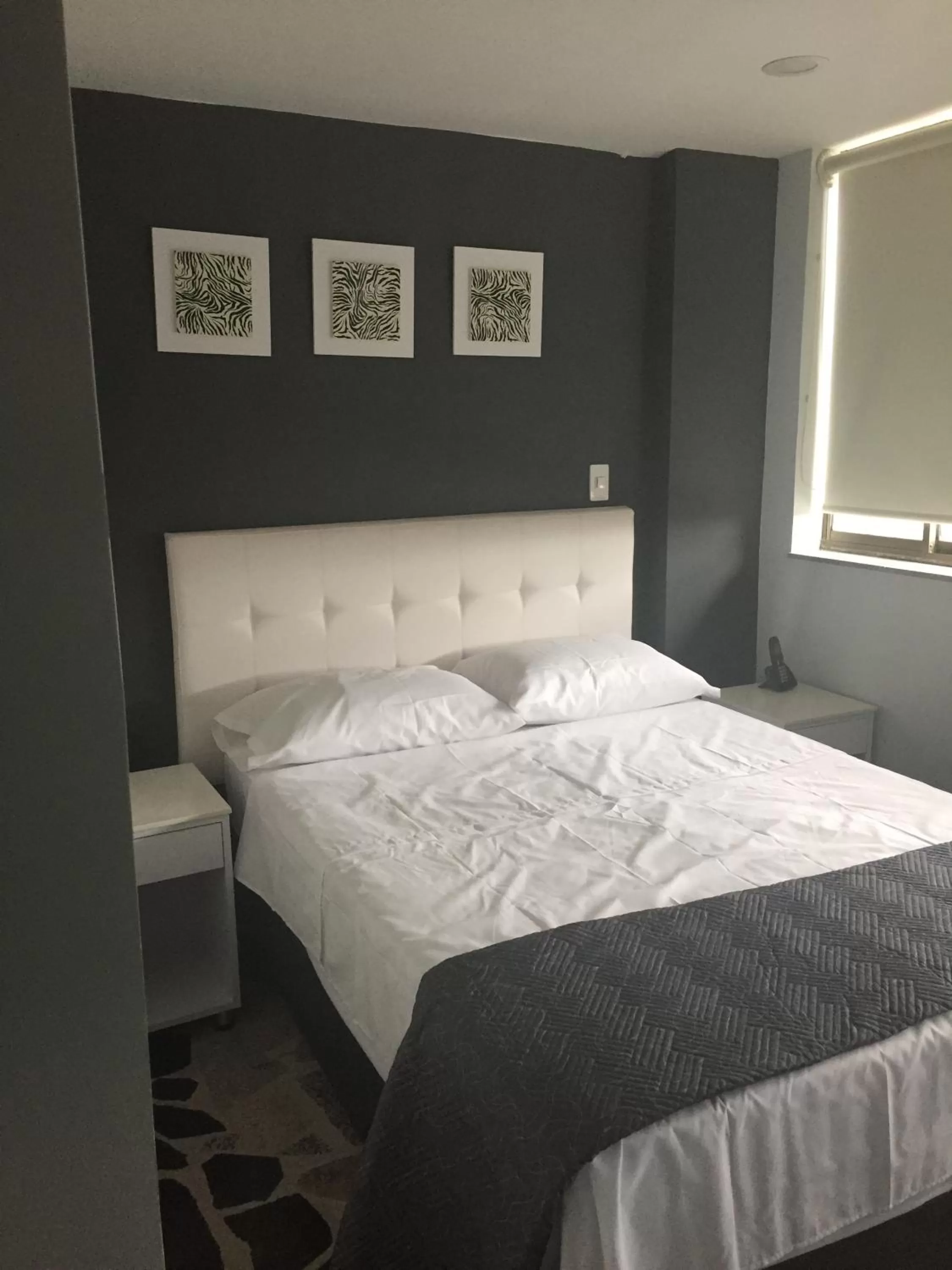 Bed in Hotel Garden City Boutique