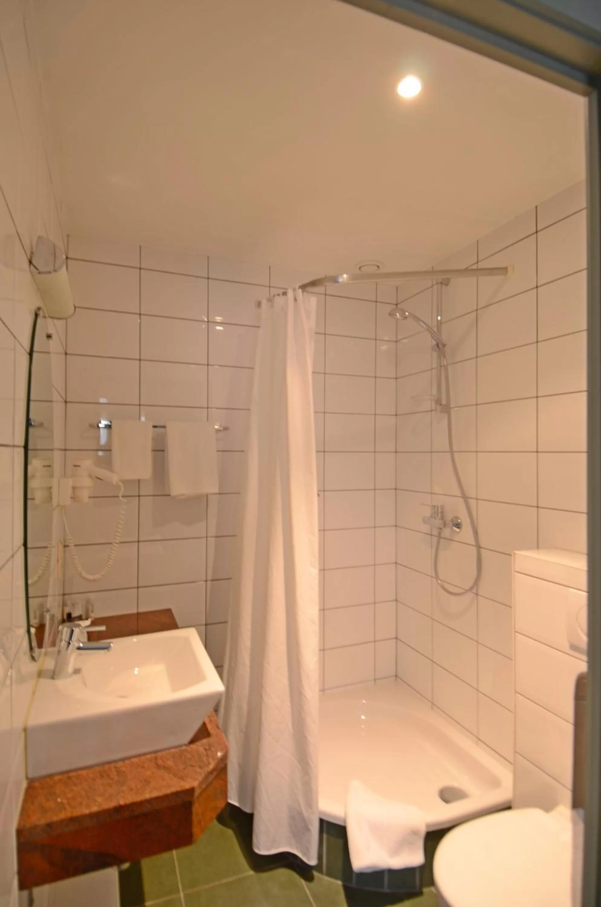 Bathroom in Hotel Malcot