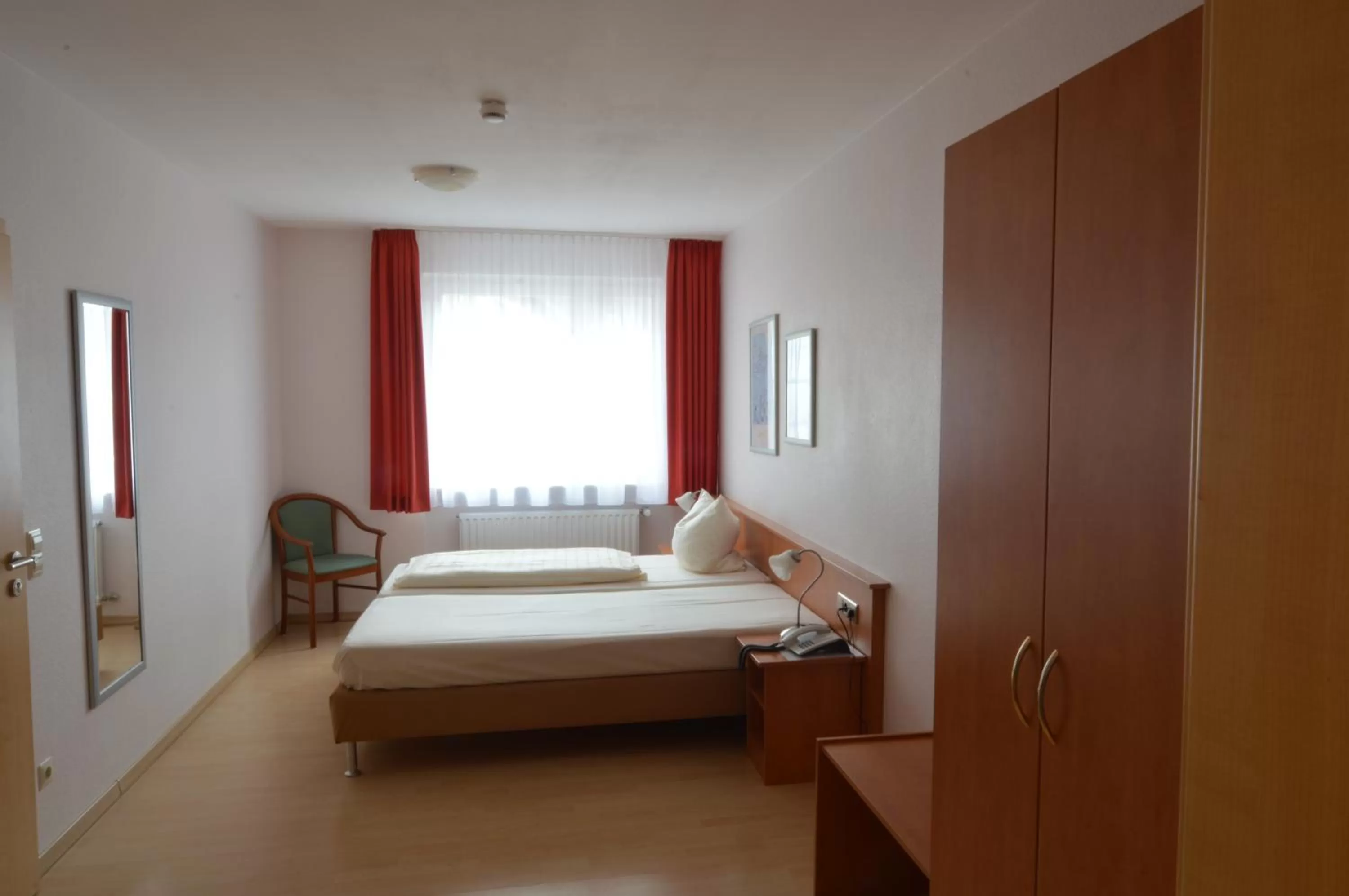 Photo of the whole room, Bed in Aktivhotel Alter Kaiser