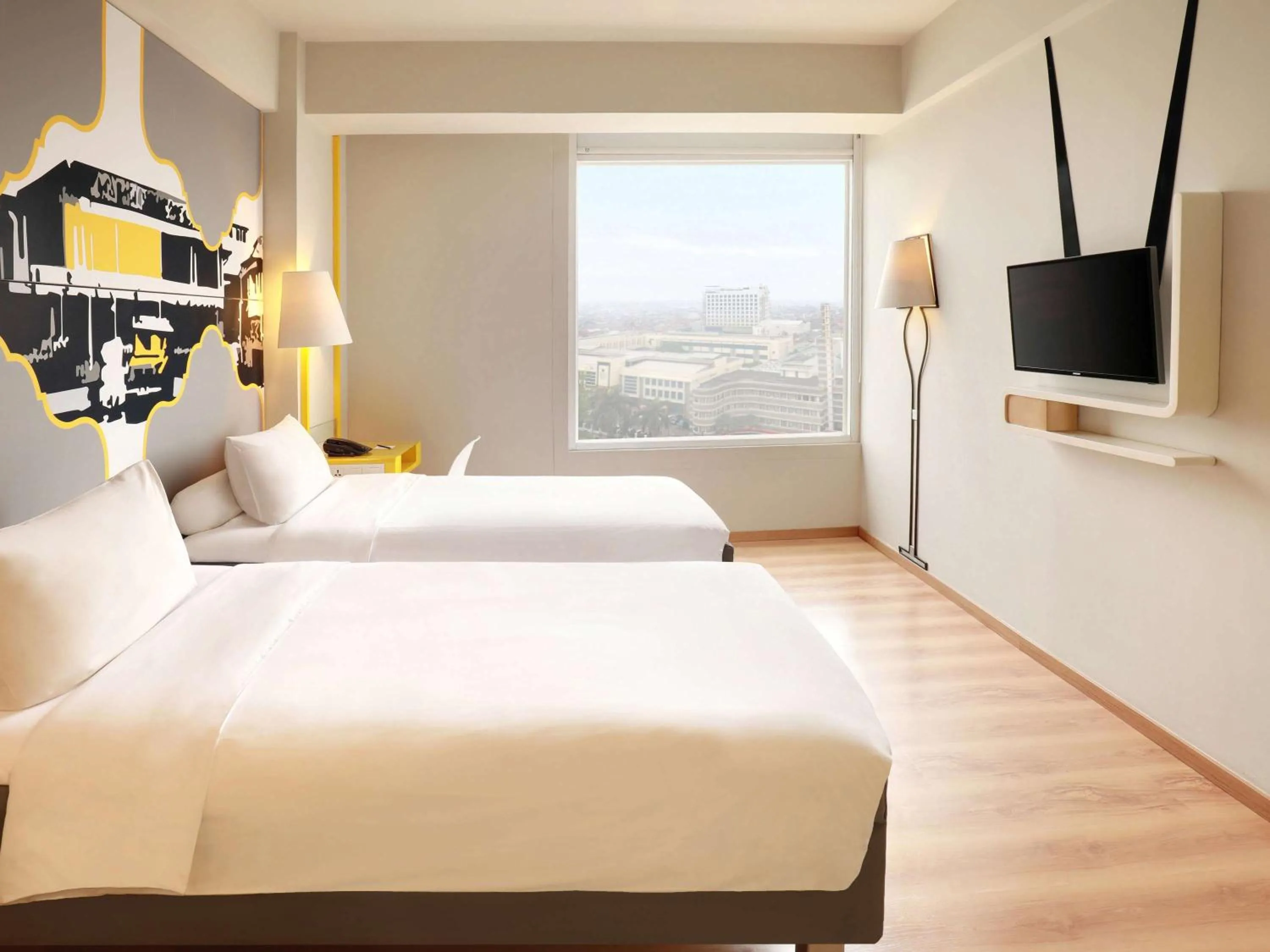 Photo of the whole room, Bed in KIMAYA Braga Bandung by HARRIS