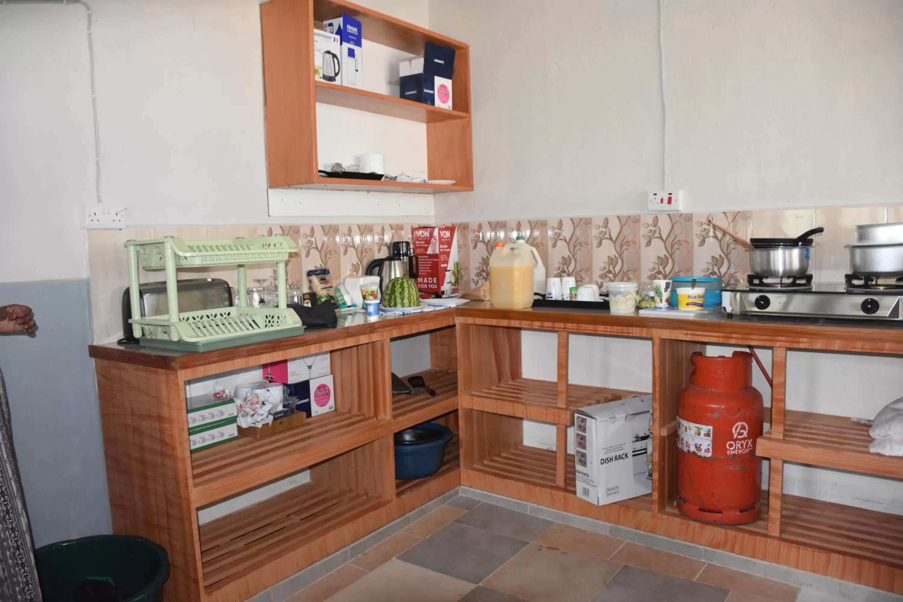 Kitchen or kitchenette, Kitchen/Kitchenette in L&J Modern Backpackers Kinondoni