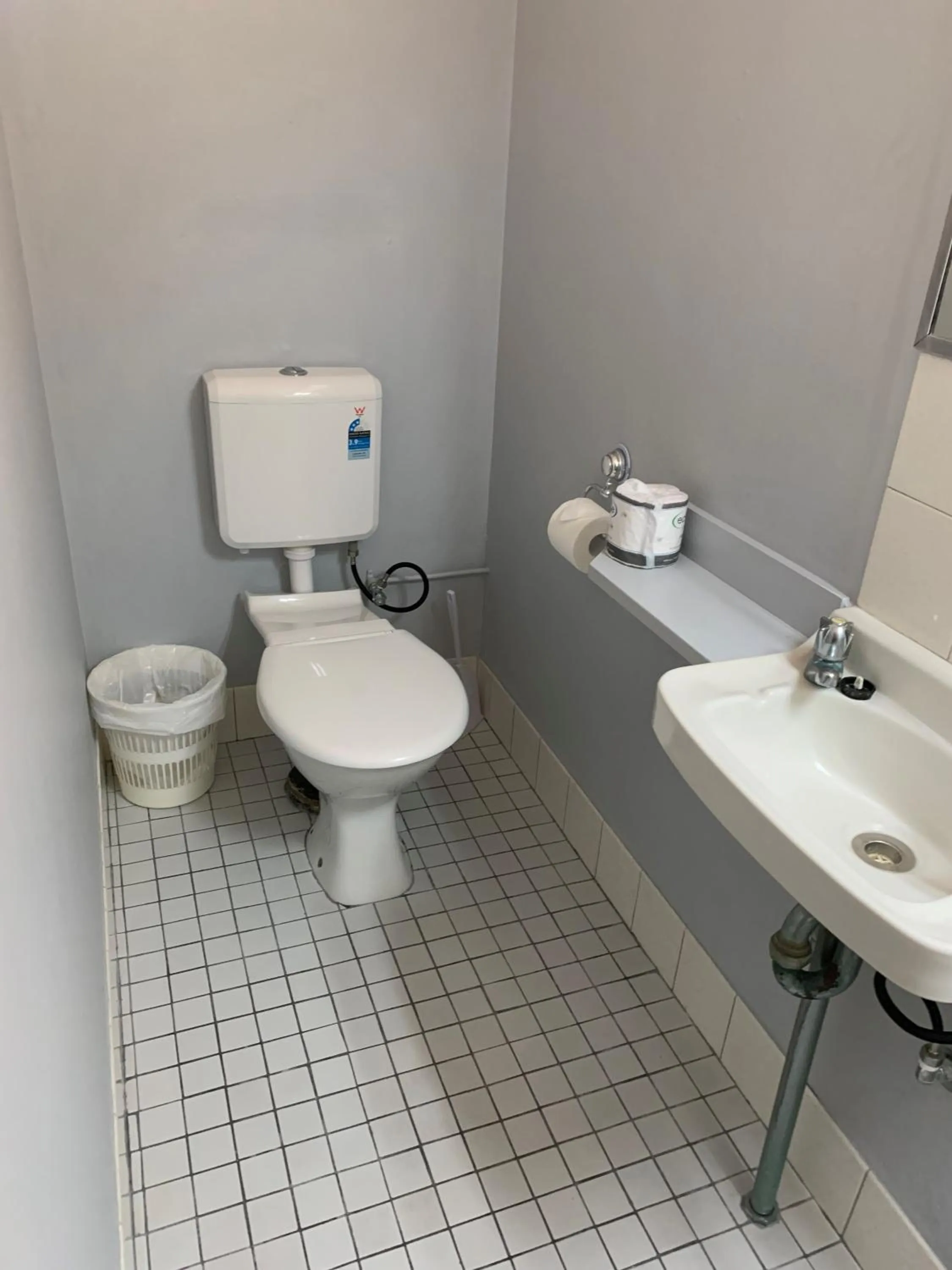Toilet in Arkana Motel
