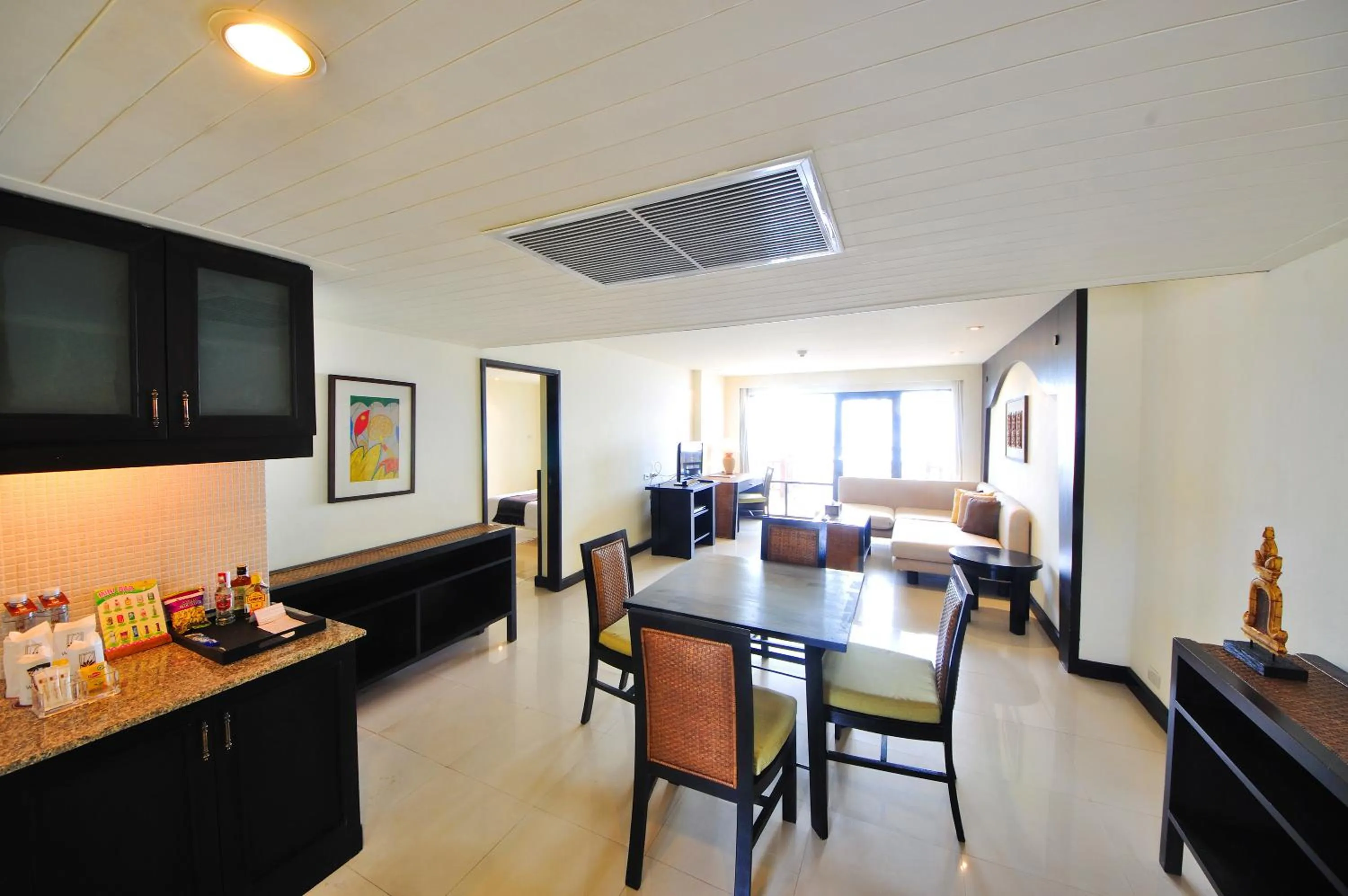 Living room in Woraburi Phuket Resort & Spa - SHA Plus