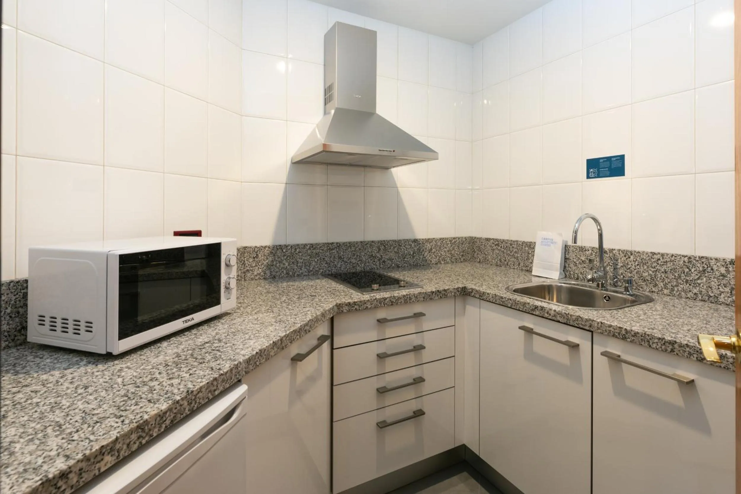 Kitchen or kitchenette in Aparthotel Campus