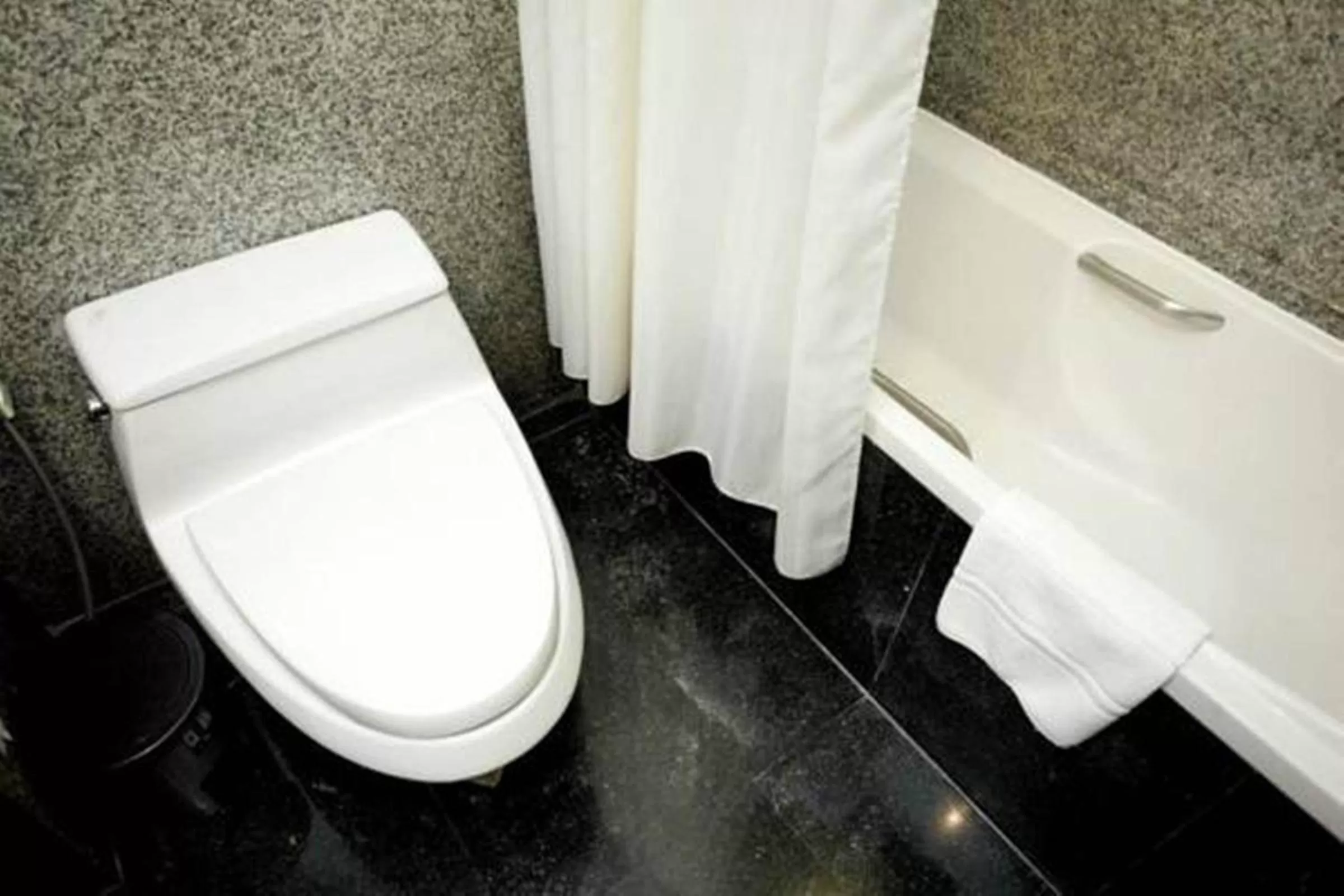 Bathroom in Majestic Suites Hotel