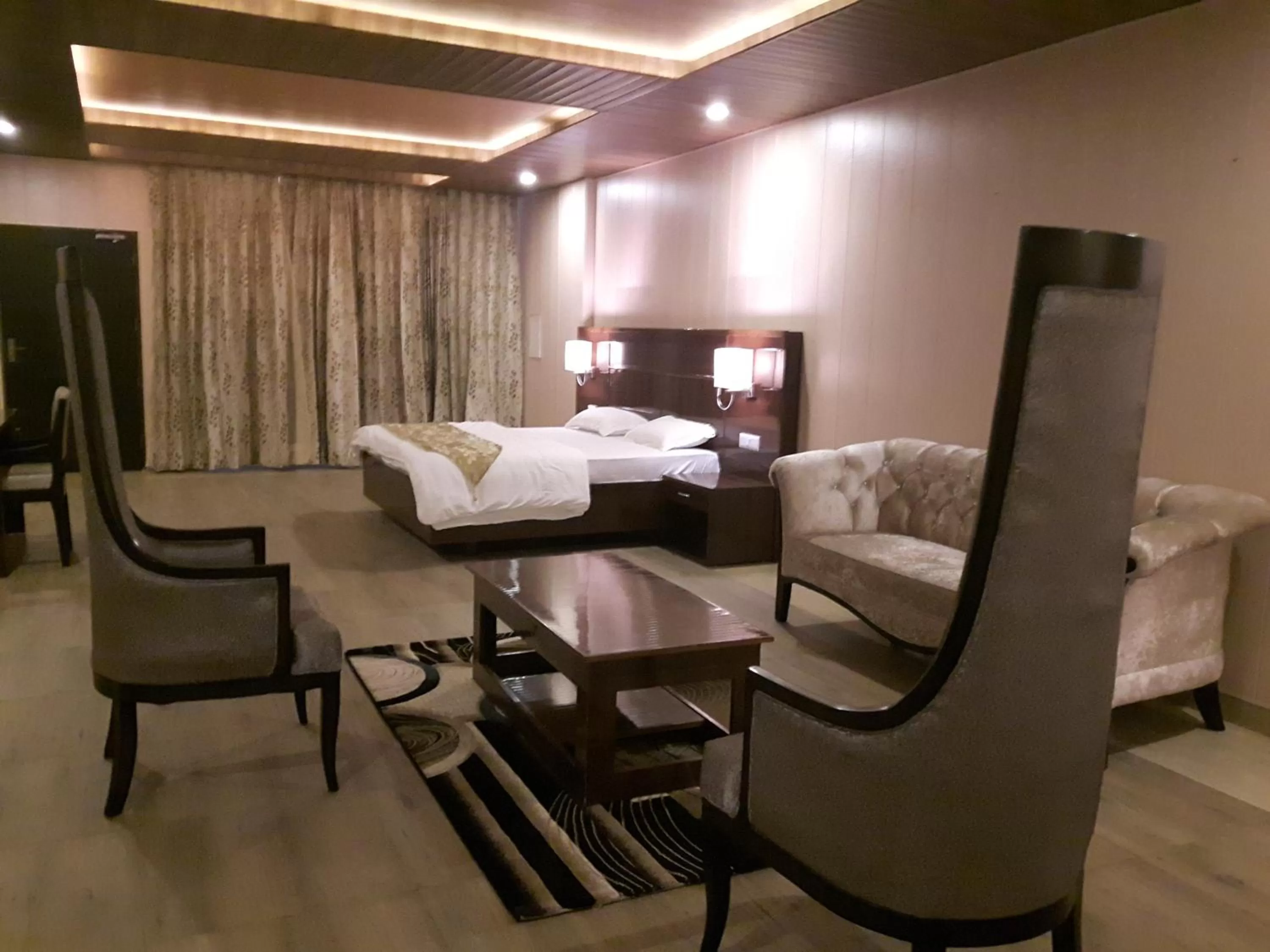 Bed in Maple Leaf Hotel