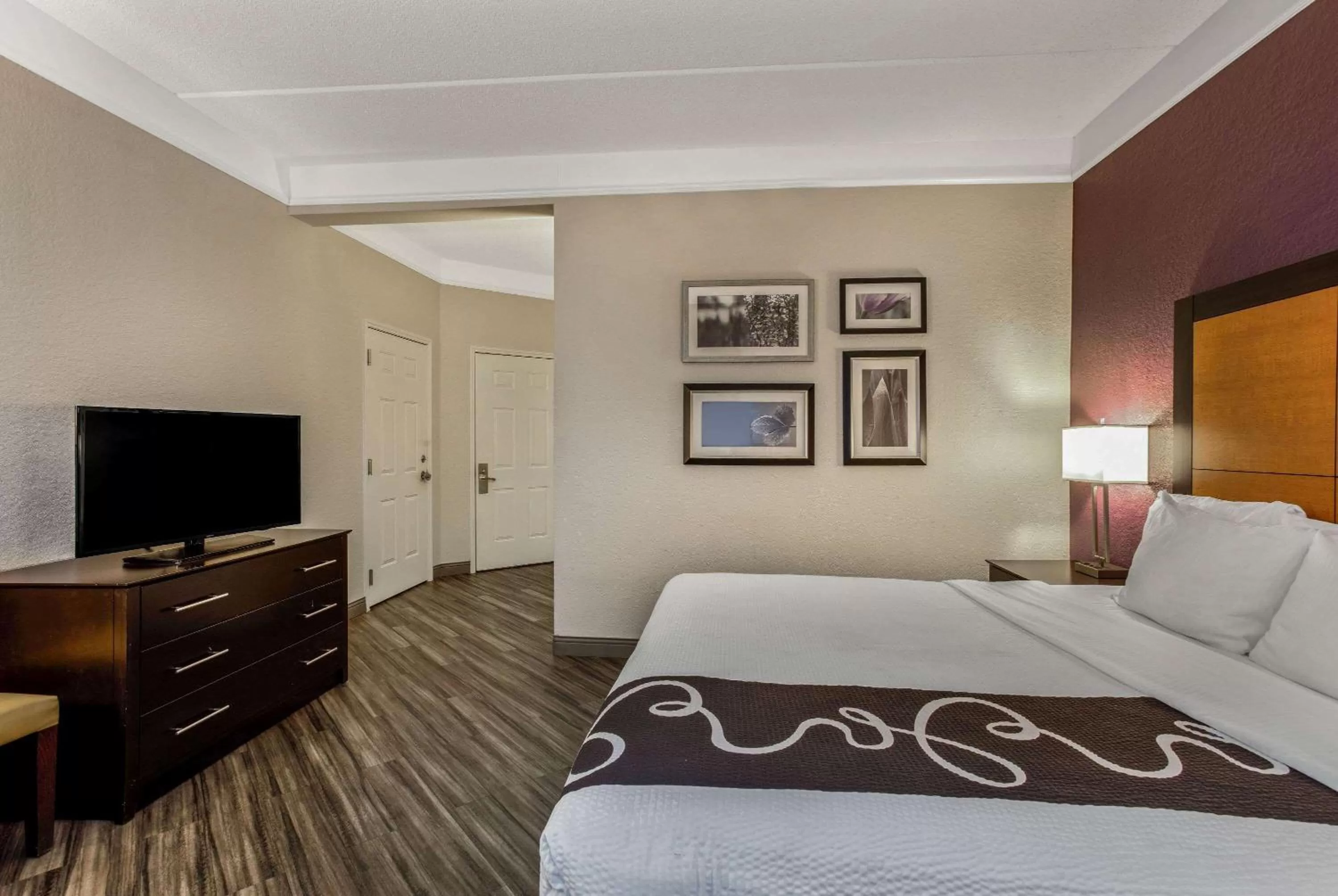 Photo of the whole room, Bed in La Quinta by Wyndham Orlando Airport North - Free Airport Shuttle!