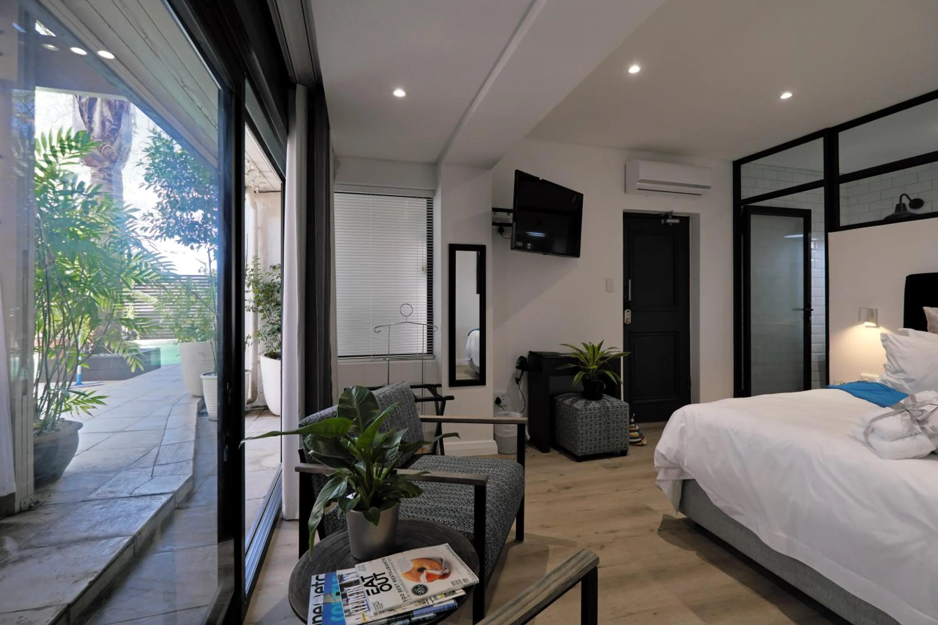 Photo of the whole room, Bed in Point B Guest House -Sustainable Solar Energy