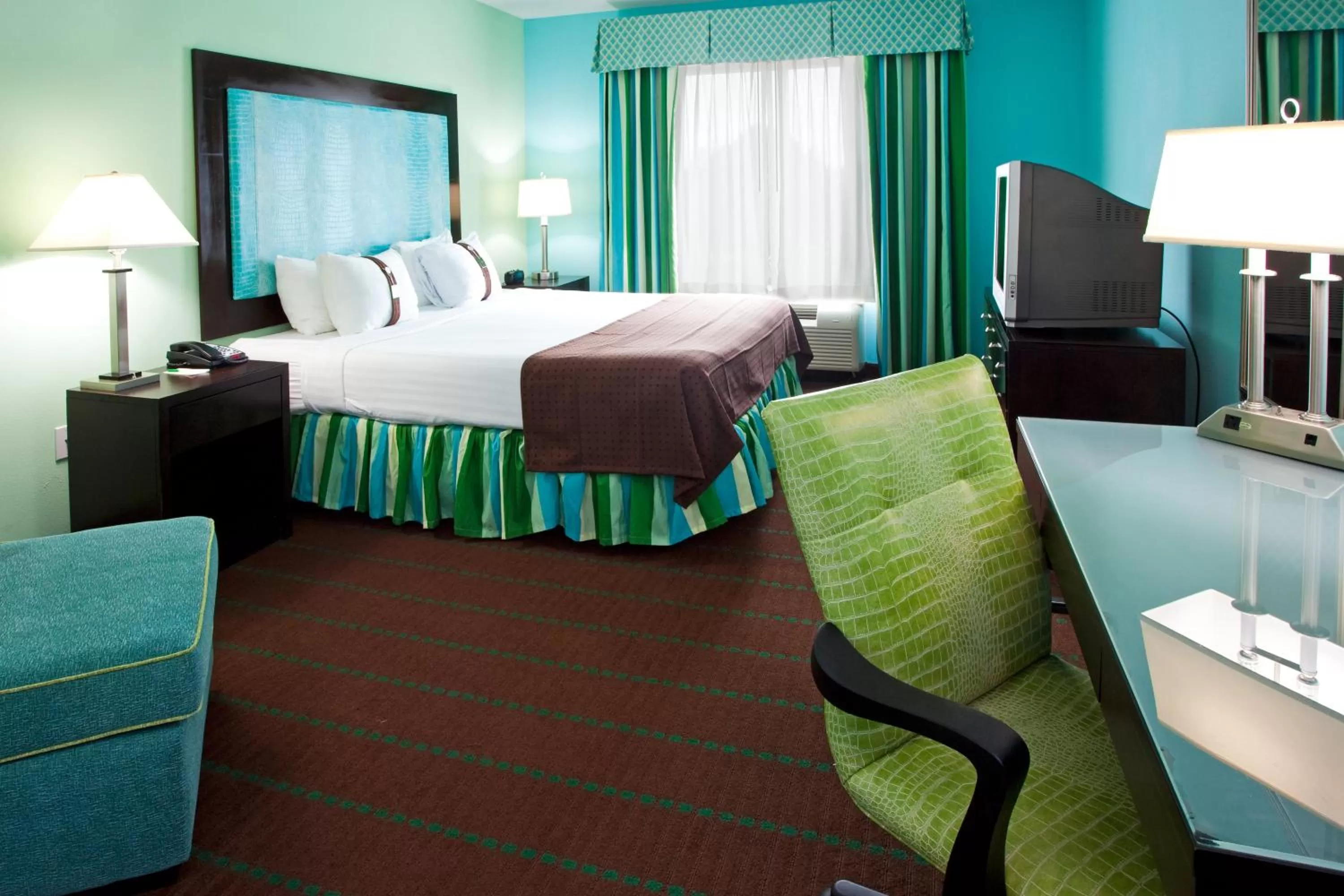 Photo of the whole room, Bed in Holiday Inn Hotel & Suites Ocala Conference Center by IHG