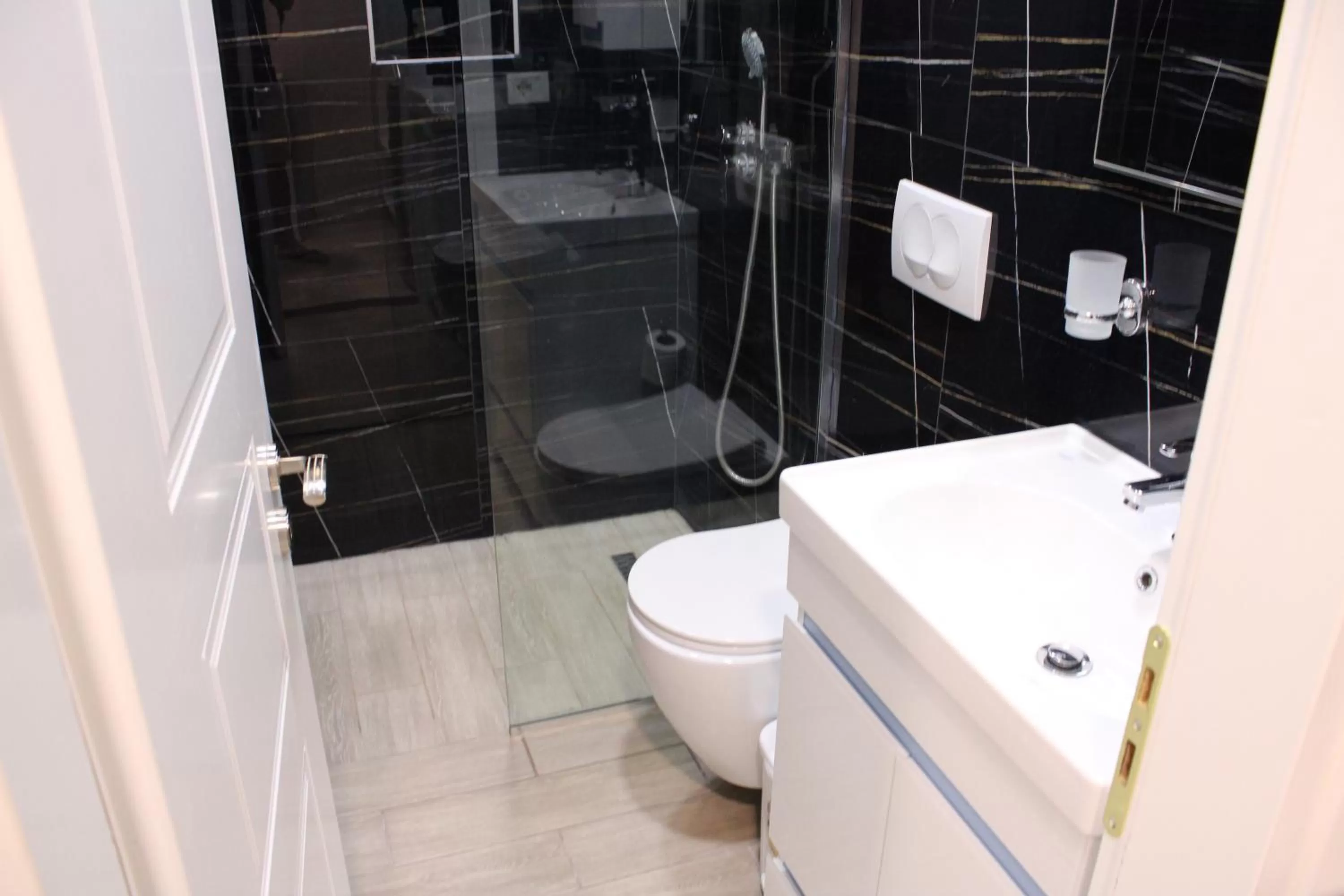 Bathroom in Aphrodite Garden Rooms & Apartment