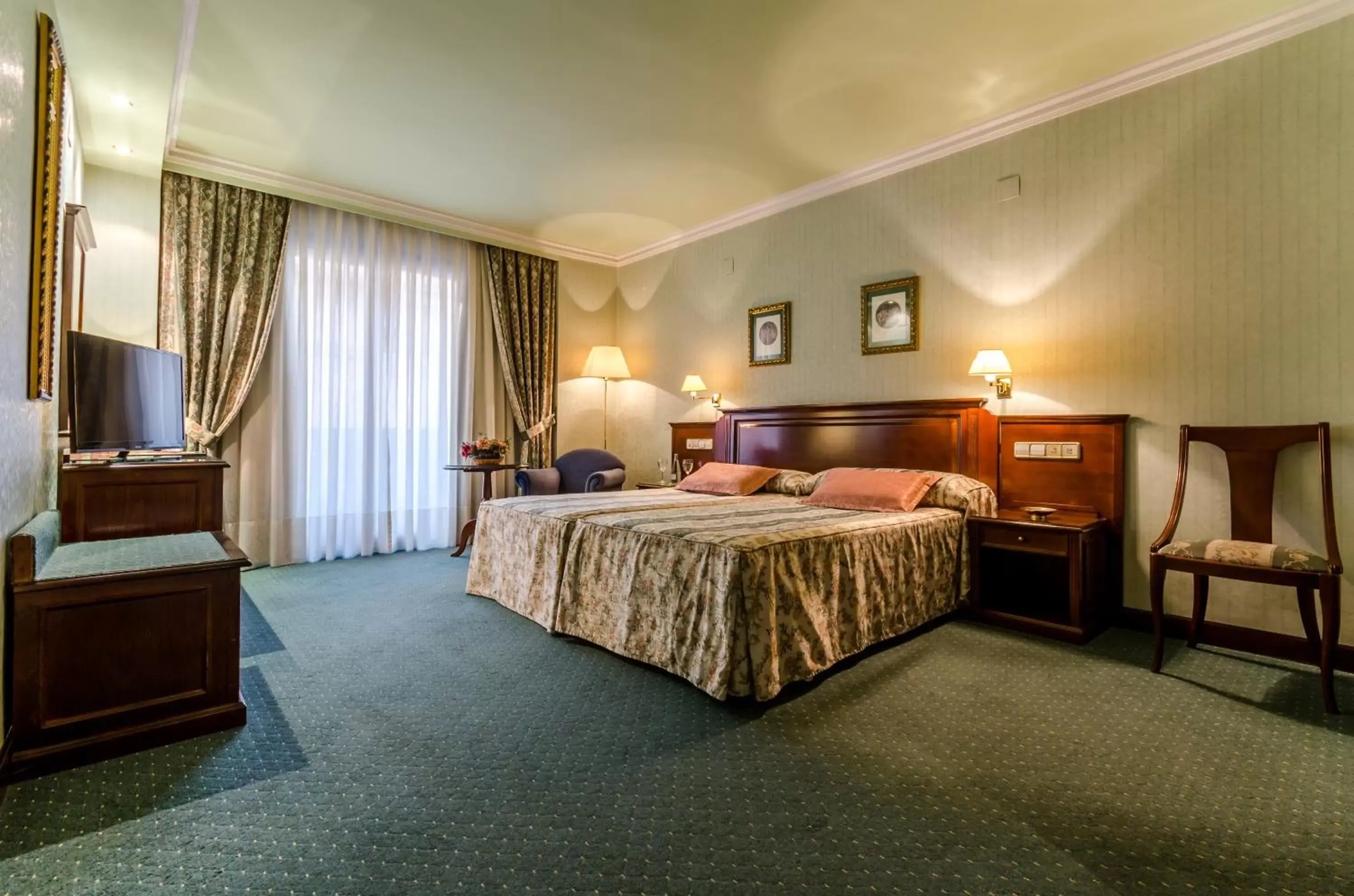 Family Room (2 Adults + 1 Child) in Infanta Cristina Family Room (2 Adults + 1 Child) in Infanta Cristina