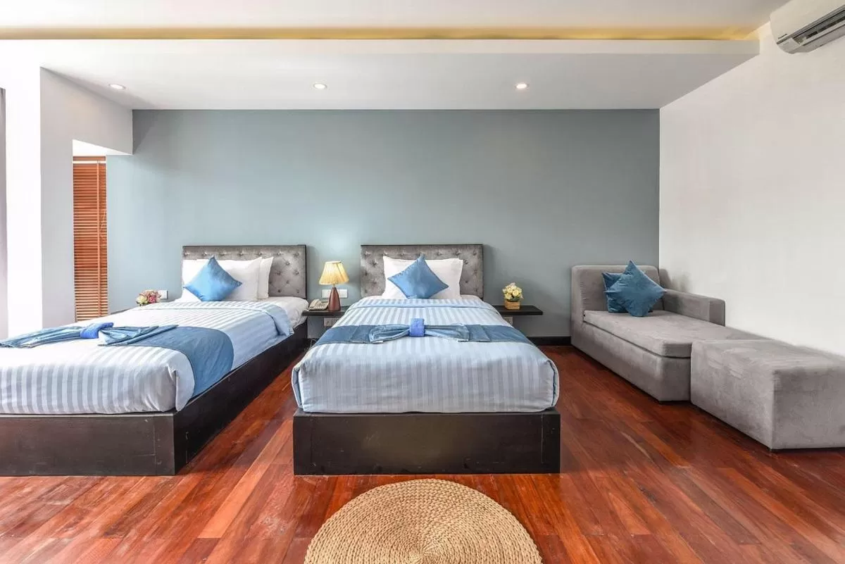 Bed in Flex Urban Family Villa Hotel