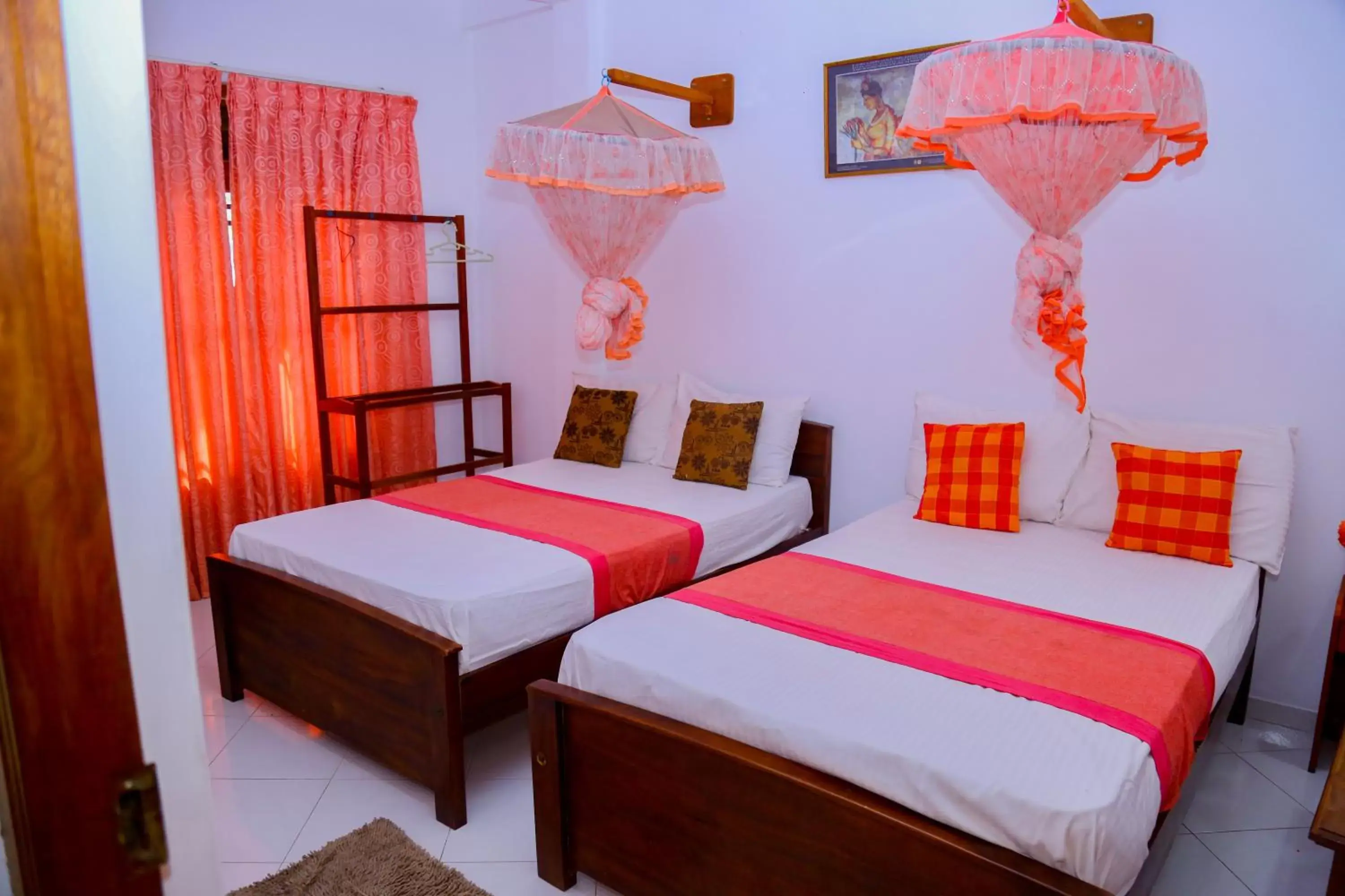 Deluxe Double or Twin Room with Garden View in Canal Side Guest House Polonnaruwa Deluxe Double or Twin Room with Garden View in Canal Side Guest House Polonnaruwa