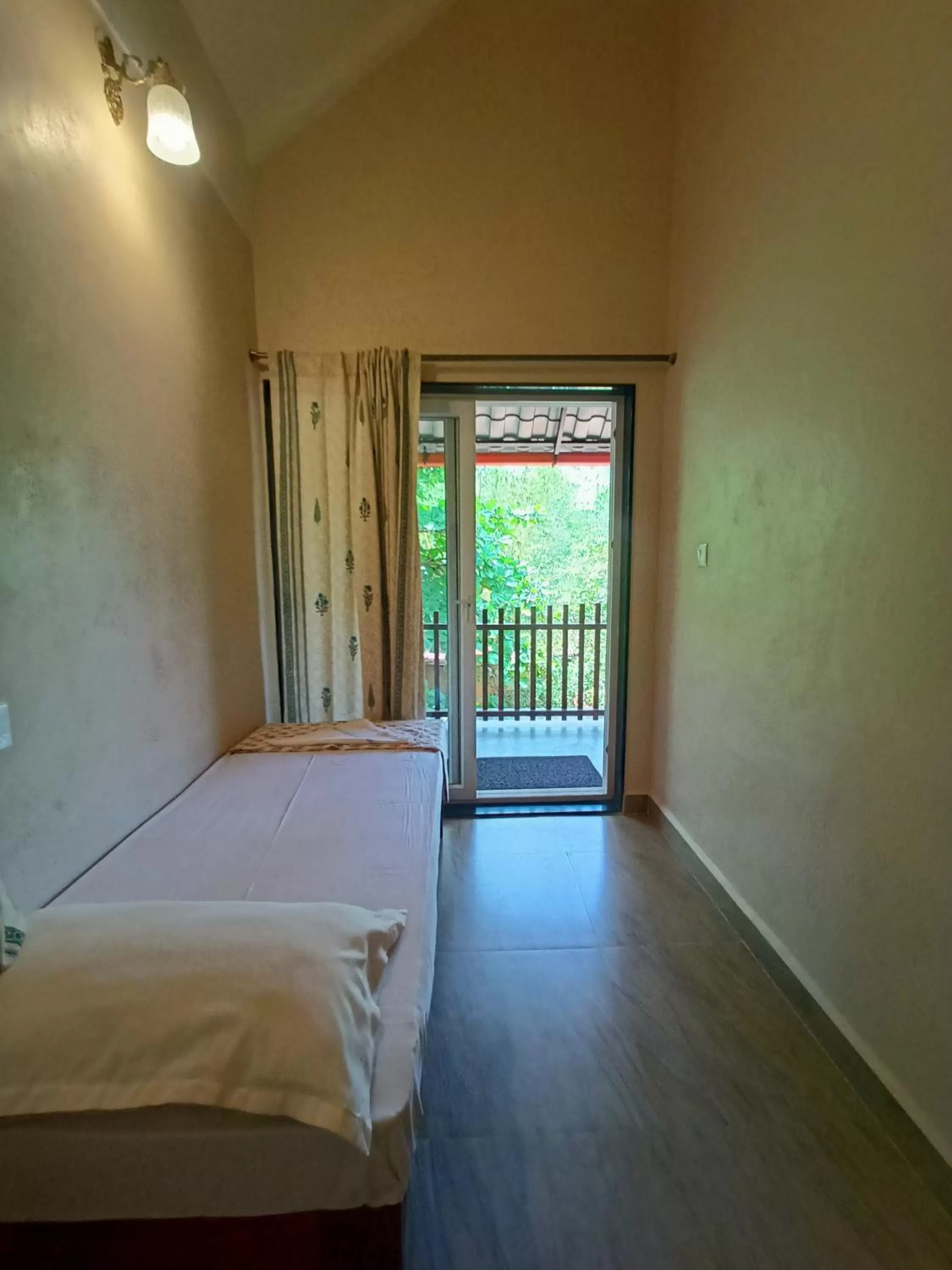 Bed in OmBodhi Retreat