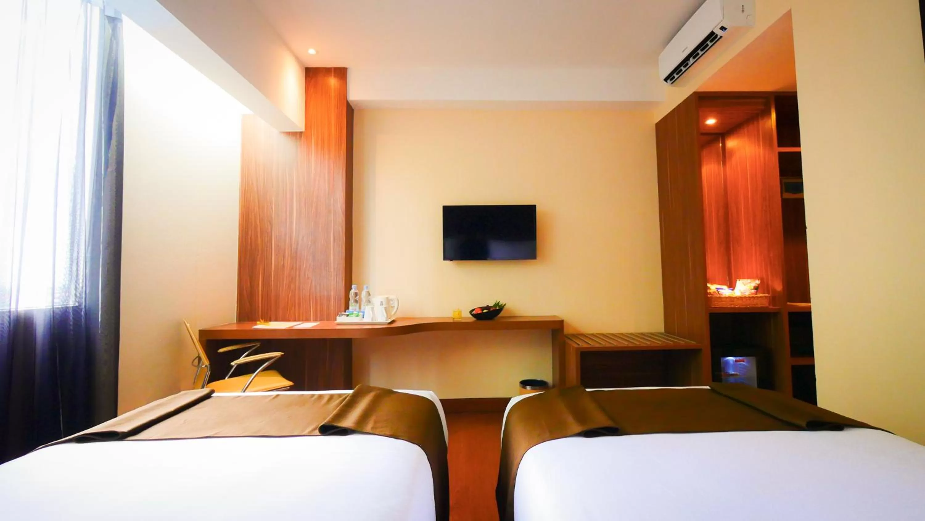 Bed in PRIME PARK Hotel & Convention Pekanbaru