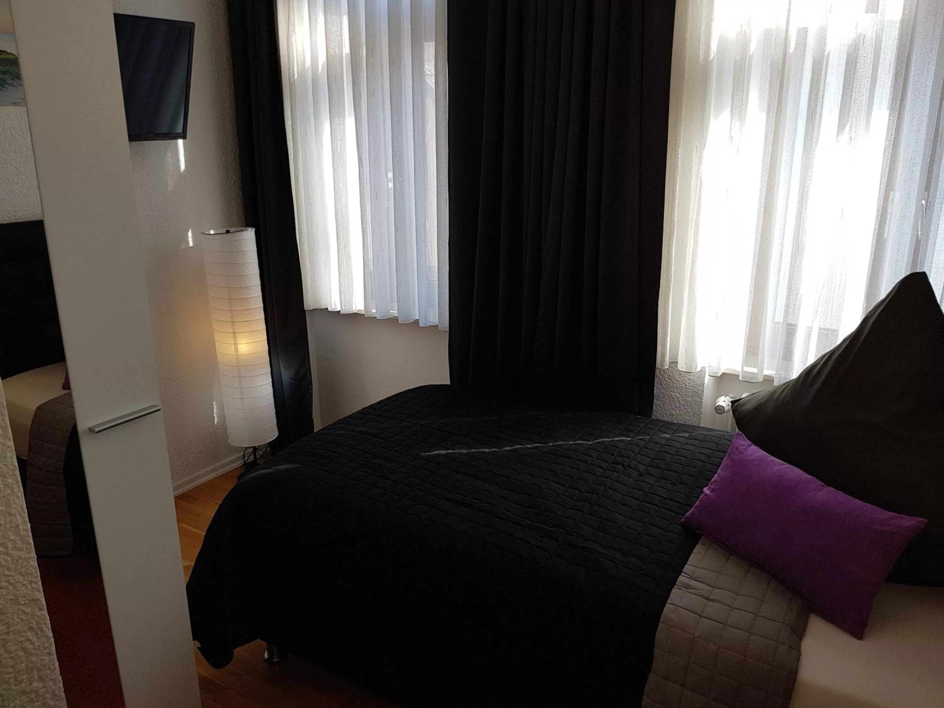 Bed in Hotel Exquisite