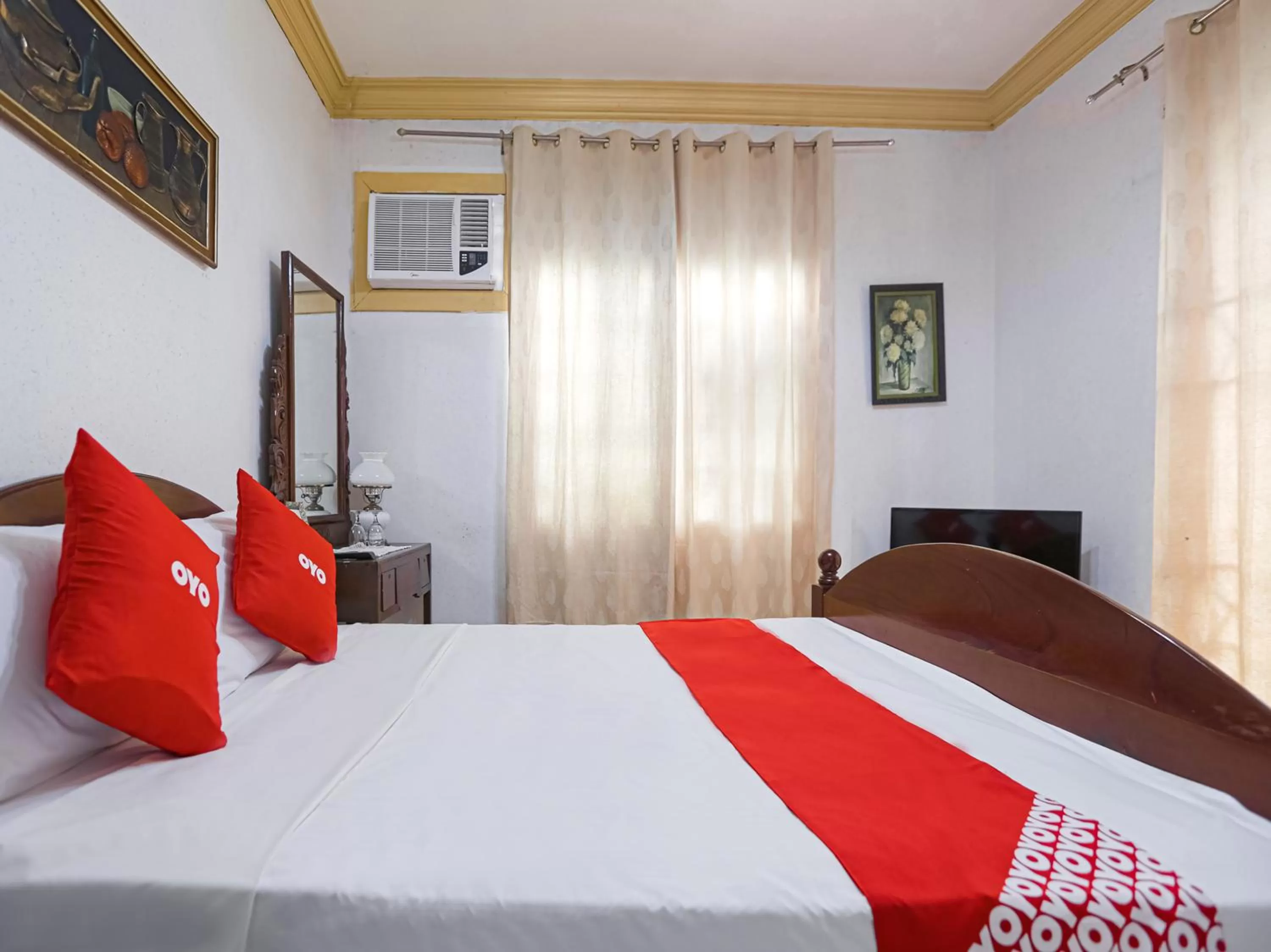 Bedroom, Bed in OYO 784 Laura's Garden Resort