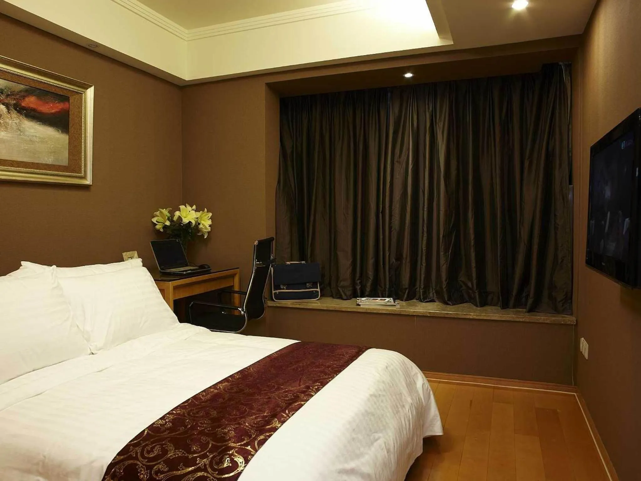 Bed in 广州丹顿行政公寓-Dan Executive Apartment Guangzhou Zhujiang New Town