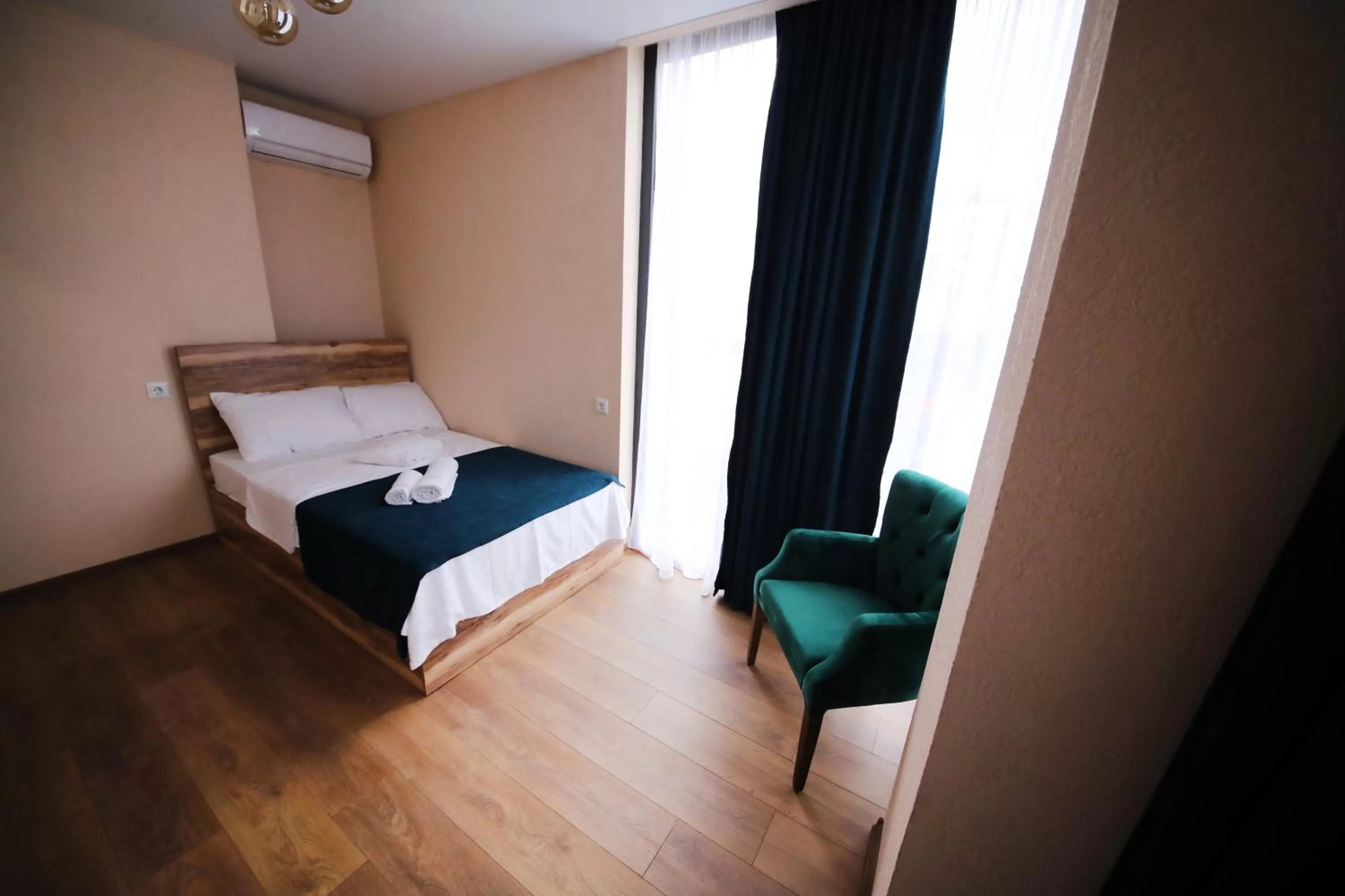 Bed in Bessarion Boutique Hotel