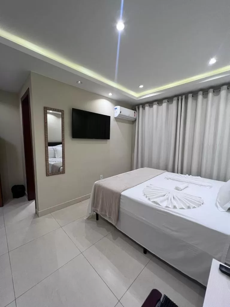 Bed in Pousada Arraial Tropical