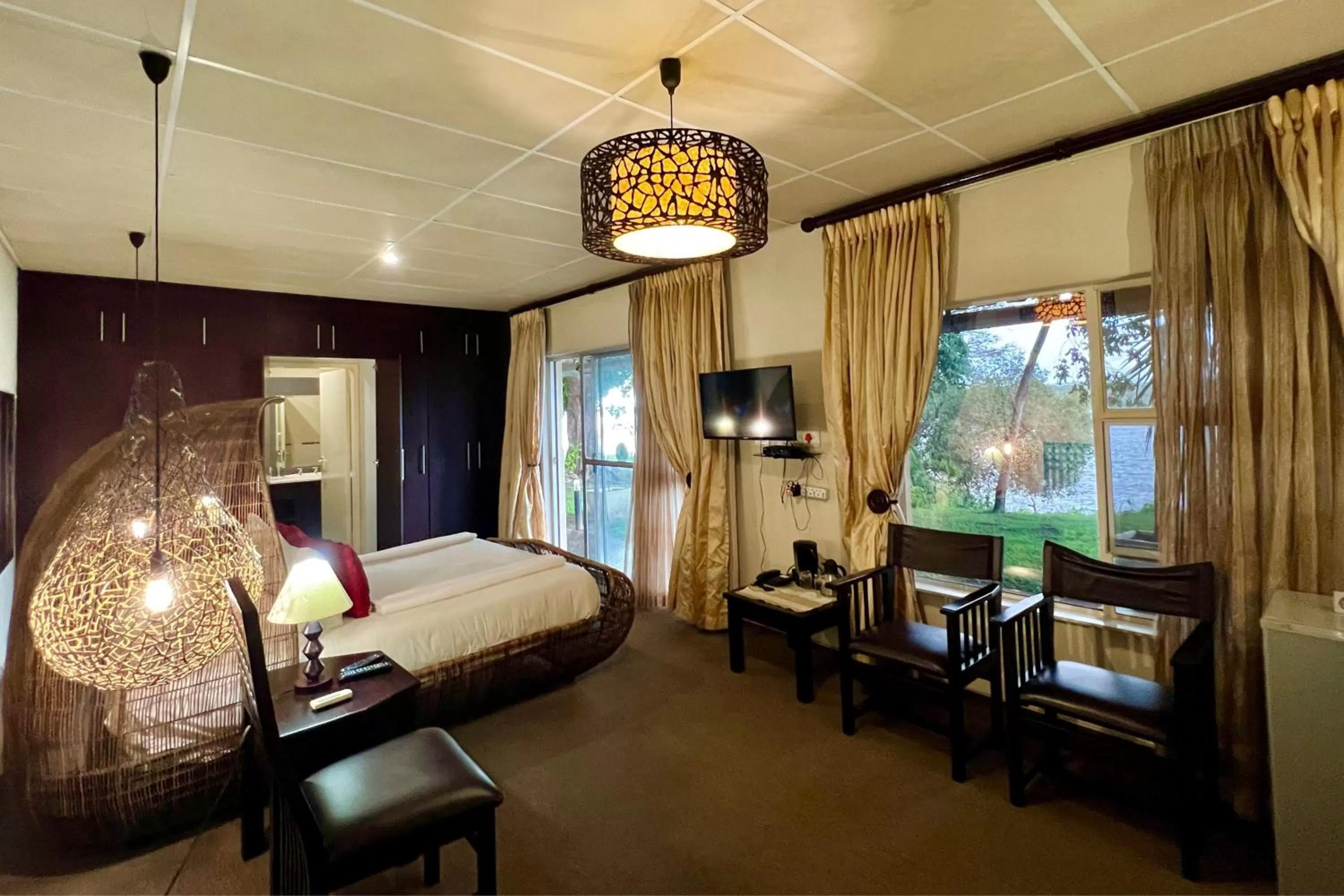 Photo of the whole room, Bed in Protea Hotel by Marriott Zambezi River Lodge